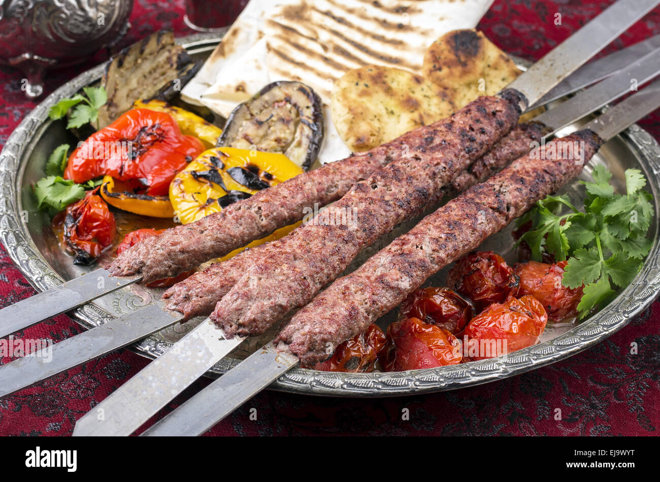 kebab-e-kubideh with grilled vegetables Stock Photo