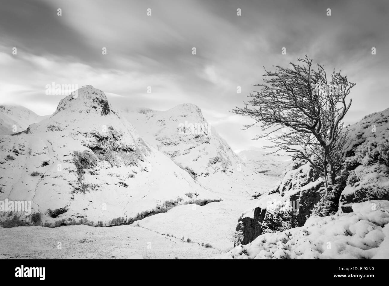 Looking out over the Three Sisters of Glen Coe on a snowy winter day Stock Photo