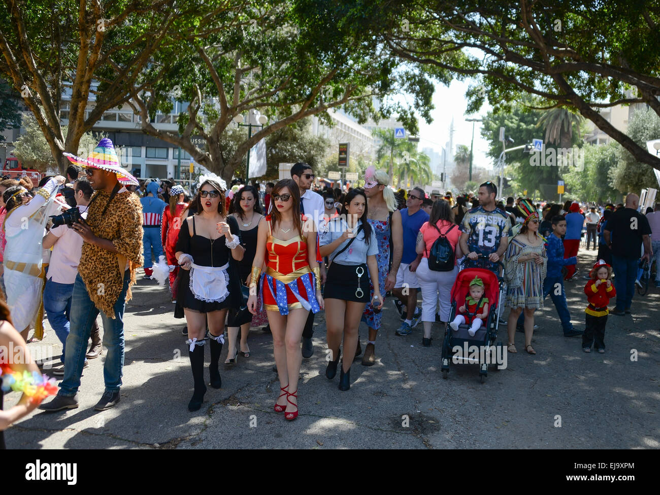 Tel Aviv, Israel - March 6, 2015: Unidentified people having fun on Purim street party. Stock Photo