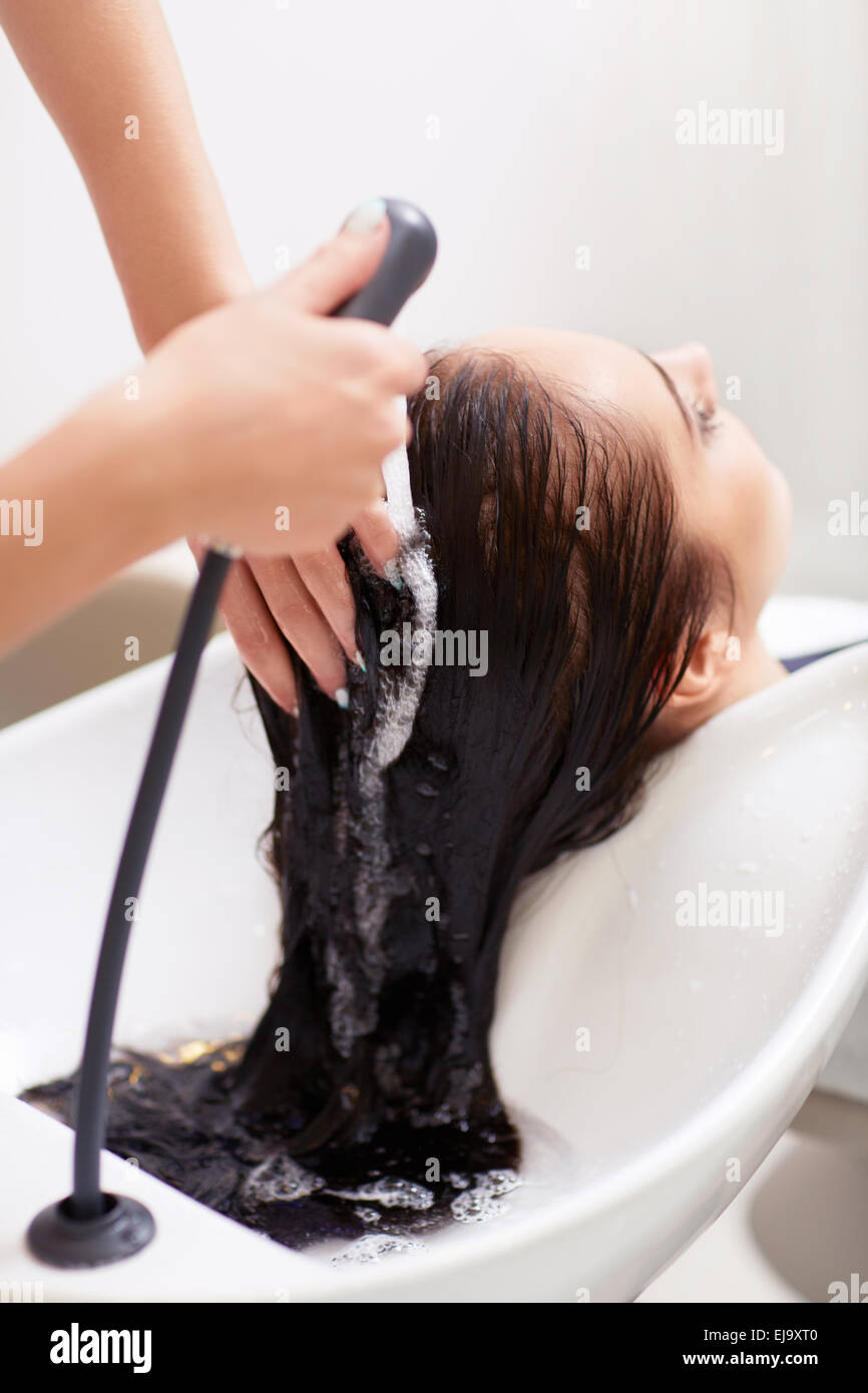 Washing hair Stock Photo