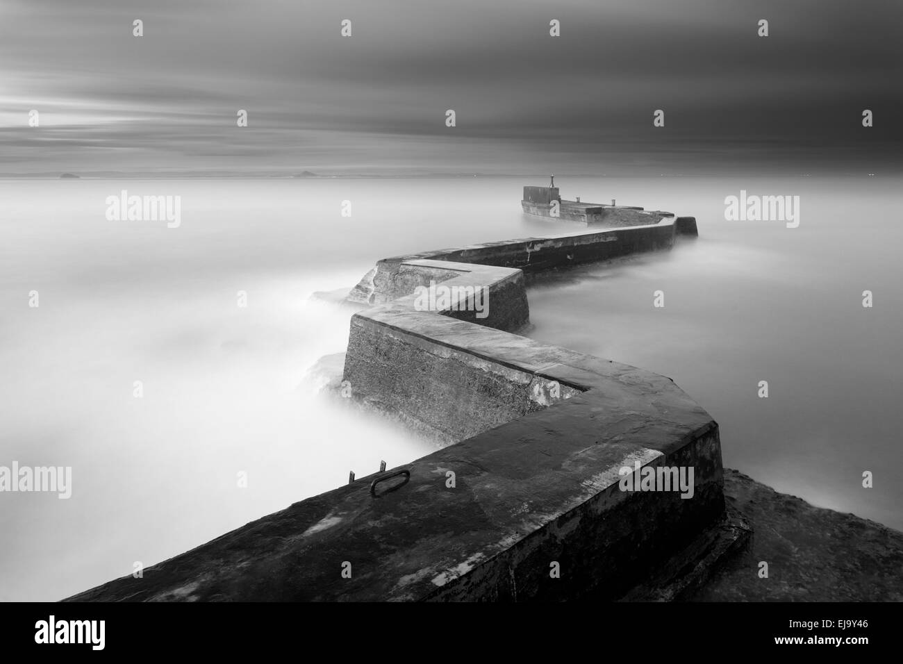 The breakwater at the fishing village of St Monans, Fife. Stock Photo
