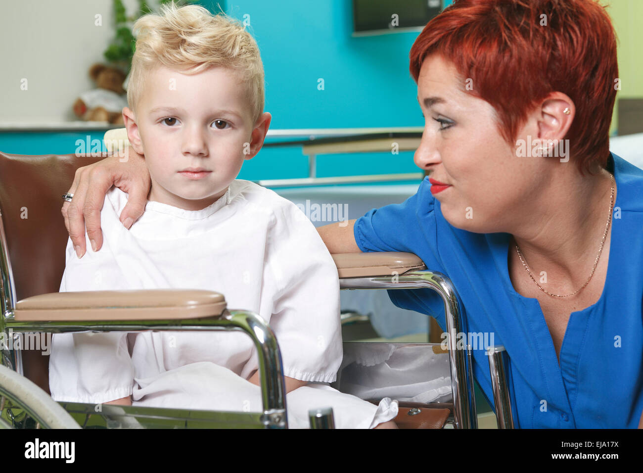 adorable little boy in the wheelchair Stock Photo - Alamy