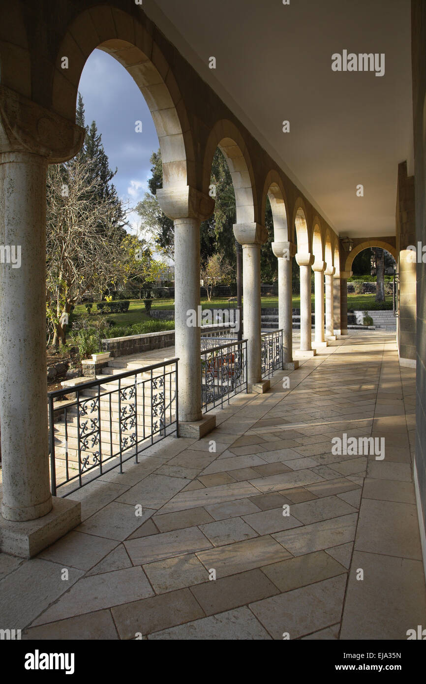 The colonnade in monastic to a garden Stock Photo