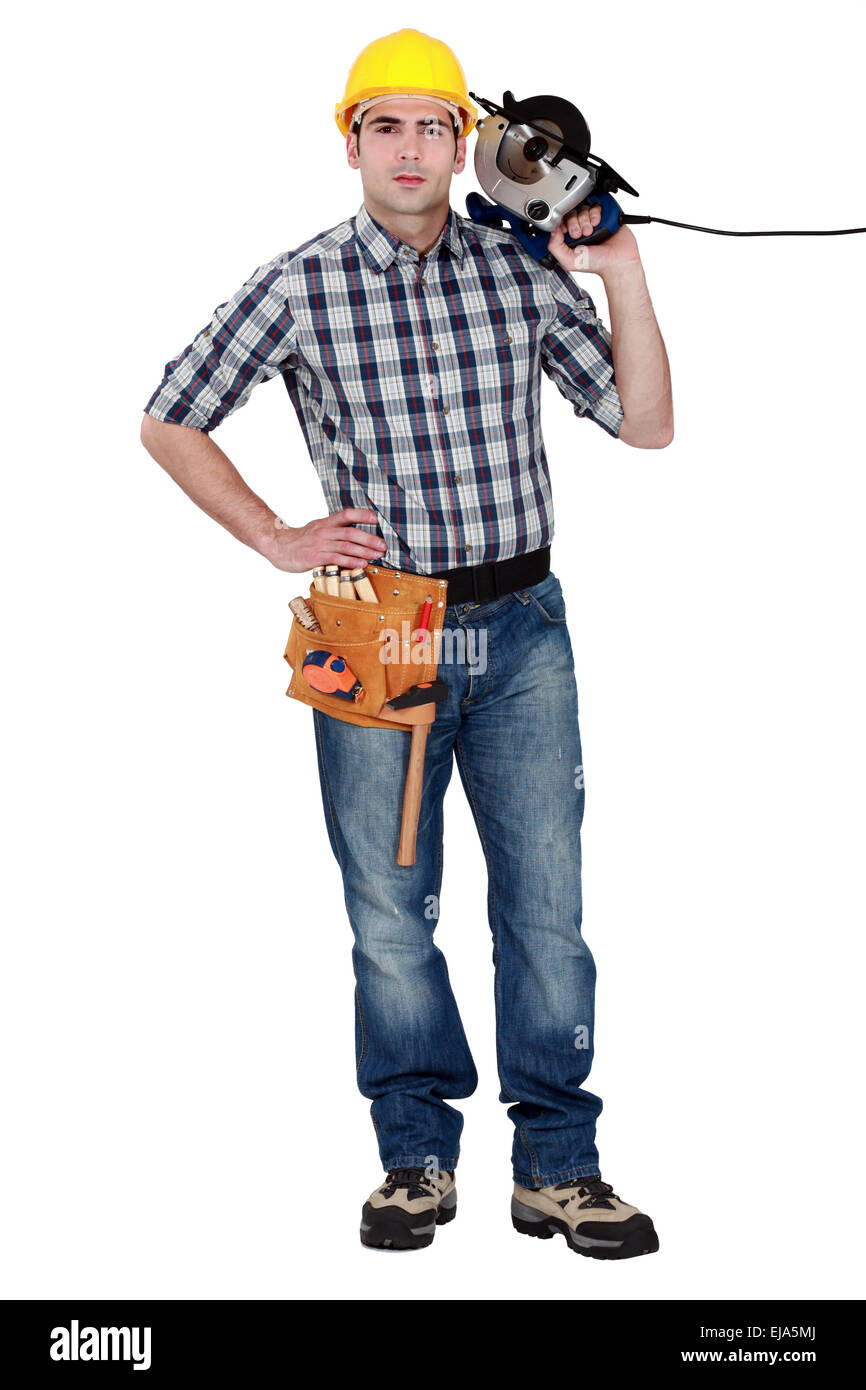Man holding circular saw Stock Photo - Alamy