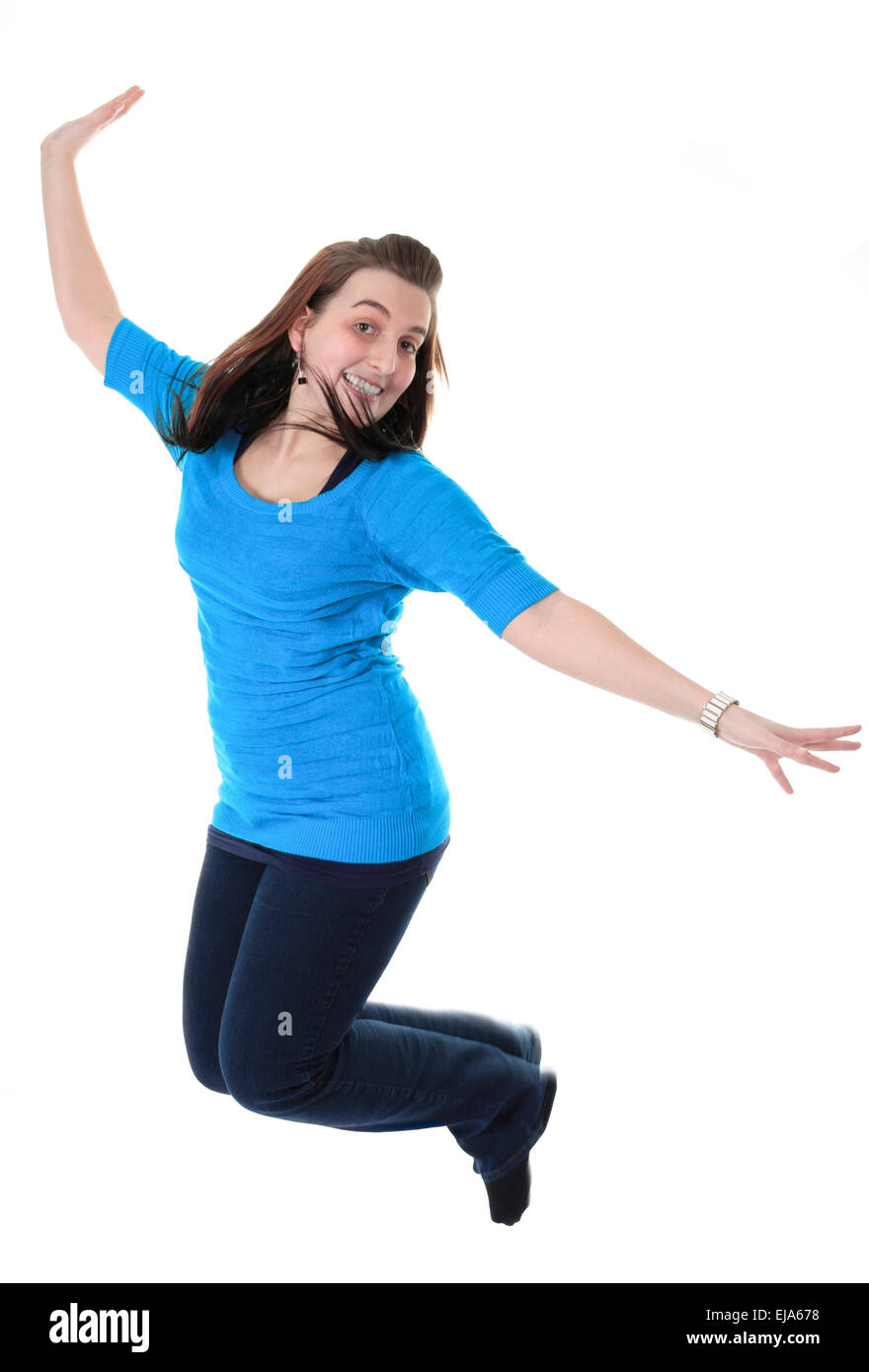 Full length studio photo of attractive woman jumping in air with Stock Photo