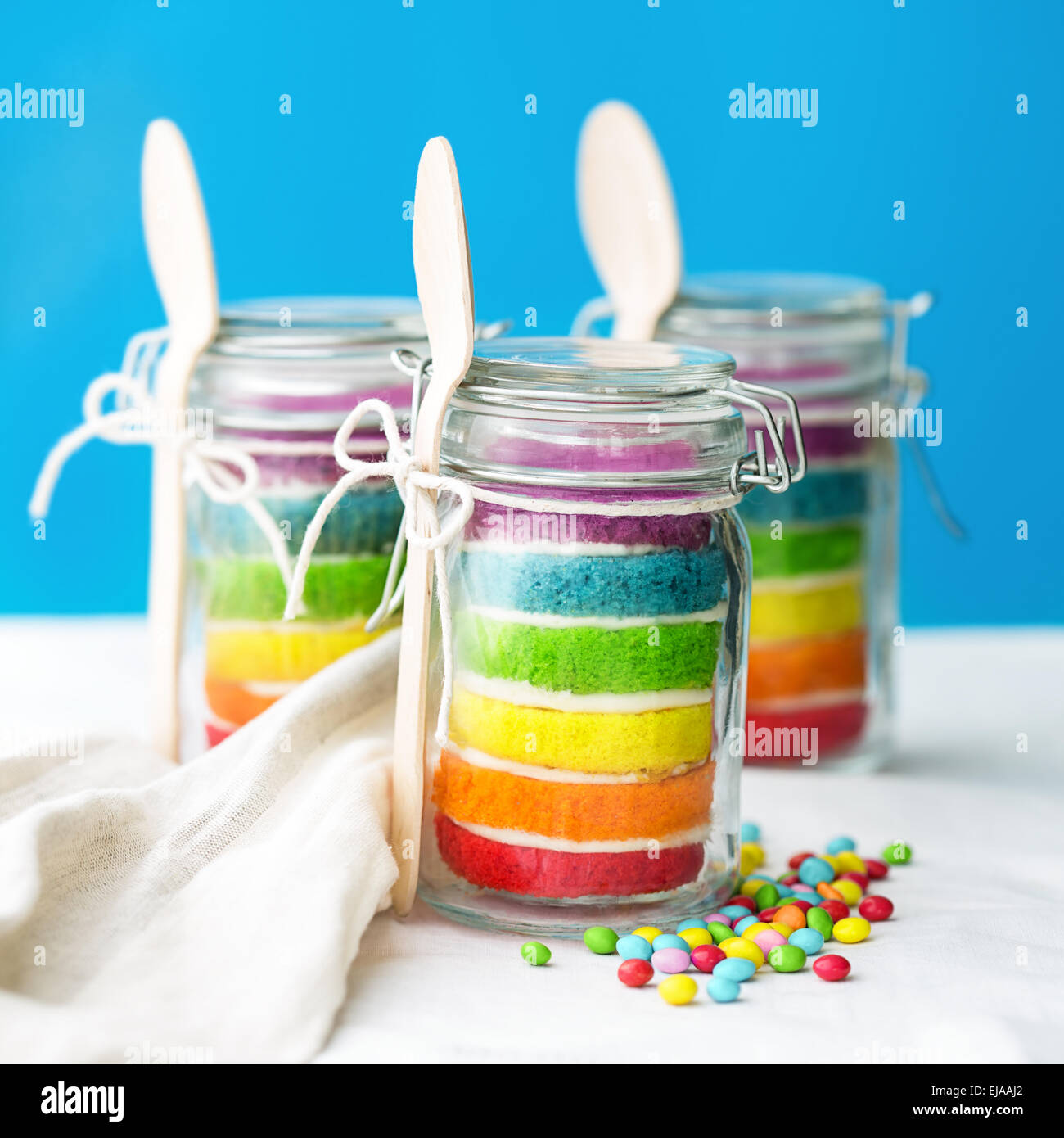 Jars of mini rainbow cake Stock Photo Alamy