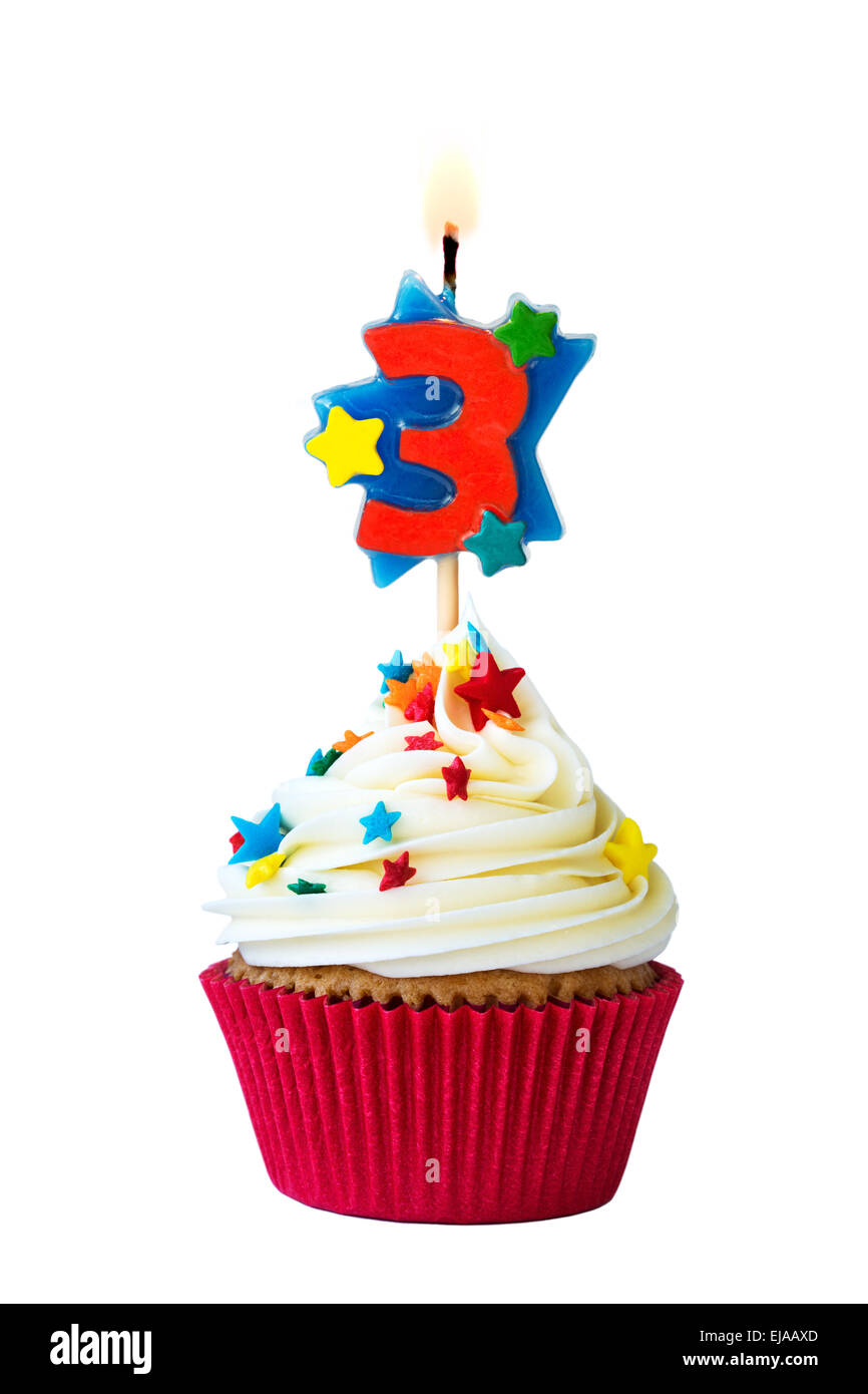 Cupcake with number three candle Stock Photo