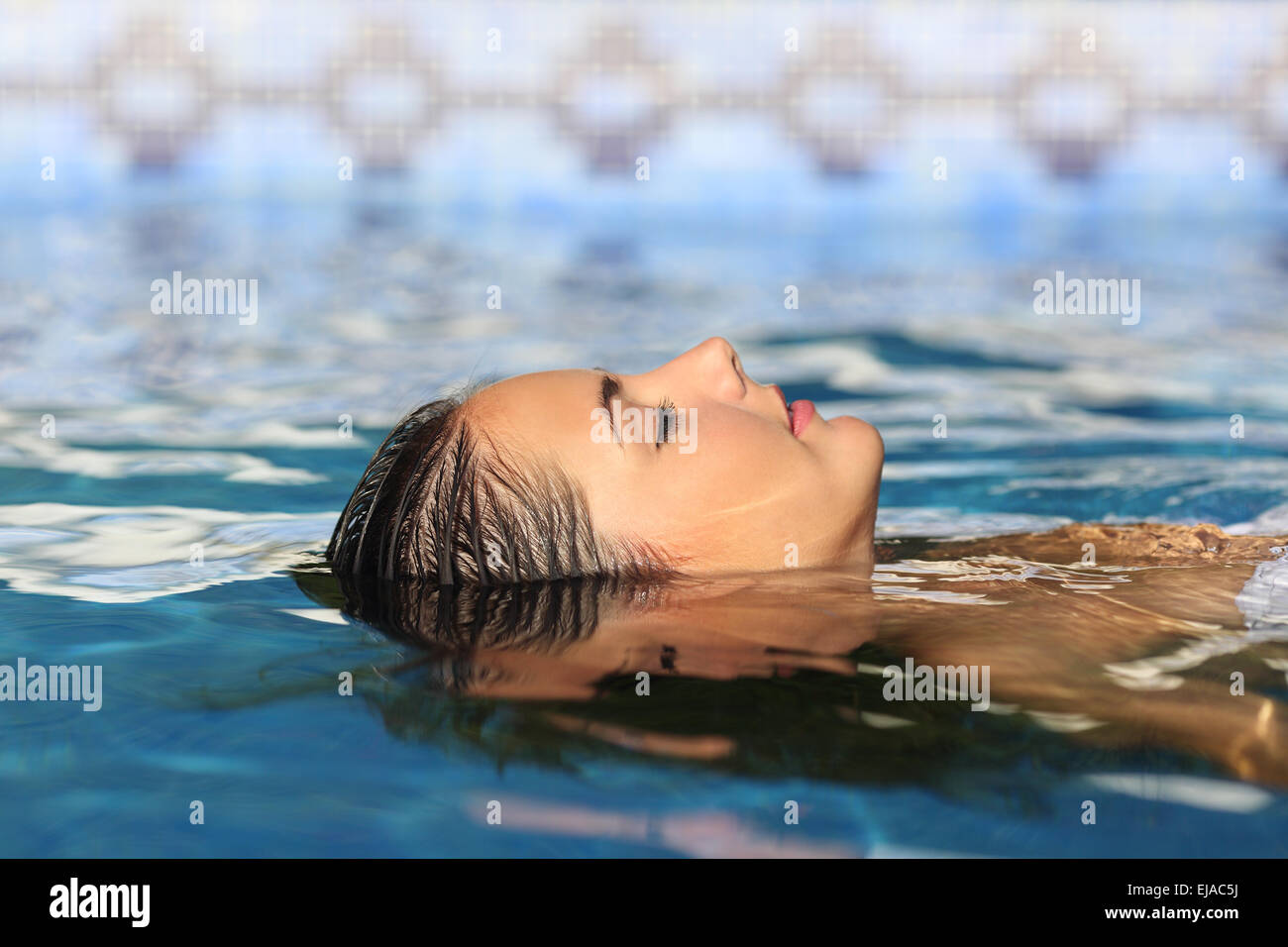 picture Person Floating In Water Side View alamy