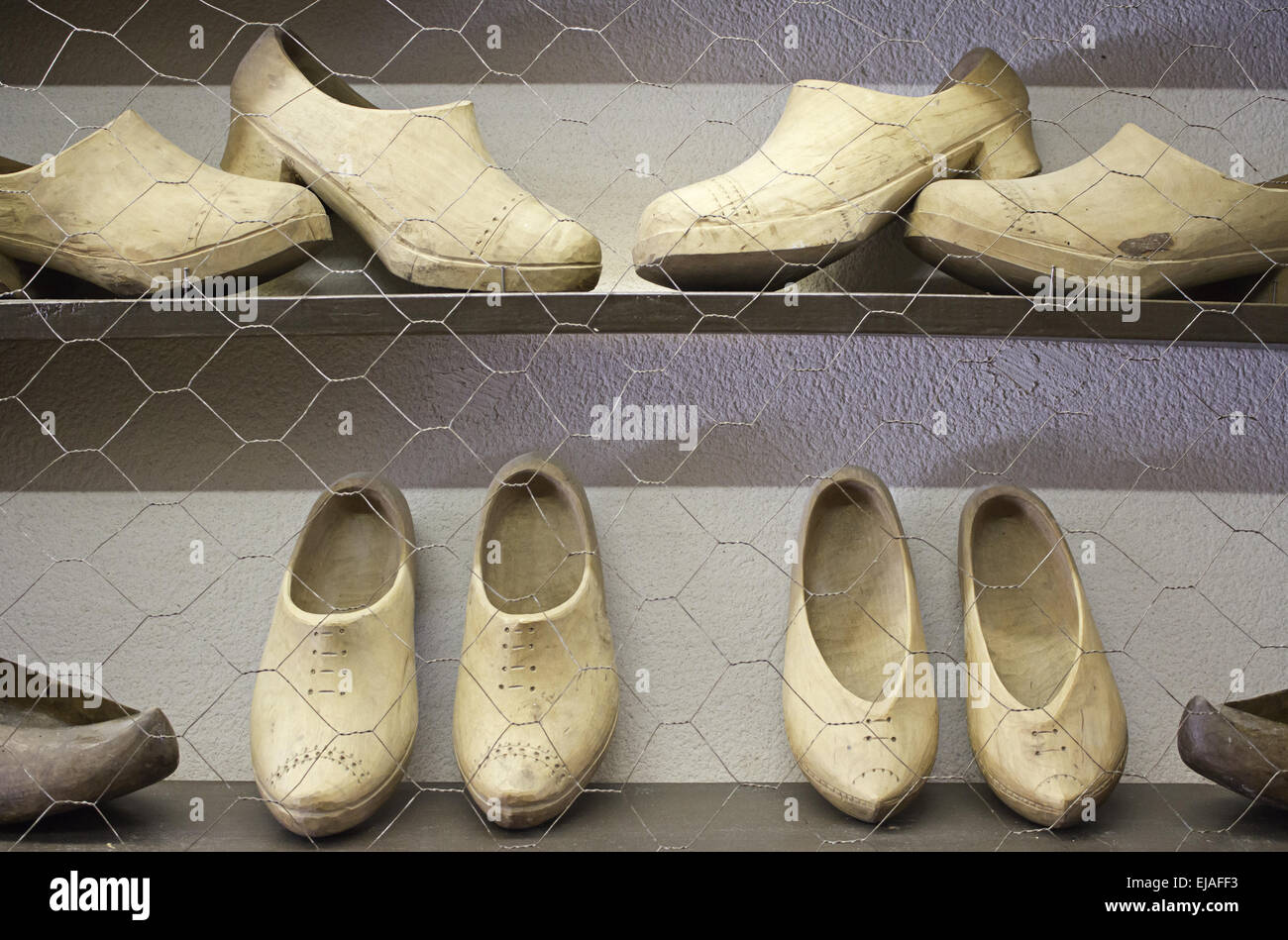 Antique wooden clogs footwear in trade, business and complement Stock Photo Alamy