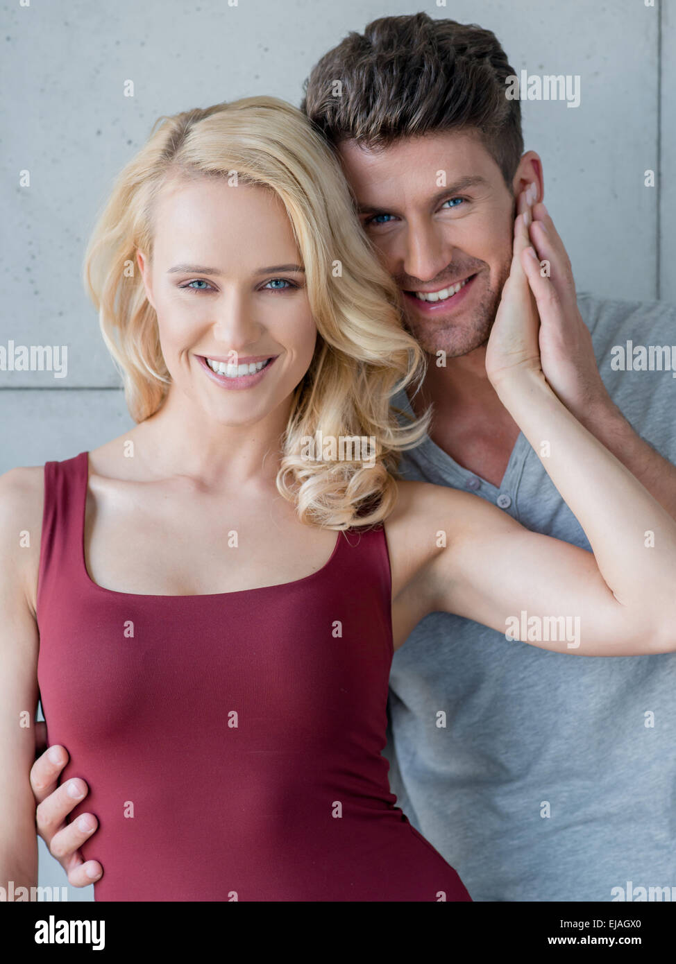 Loving happy couple posing for the camera Stock Photo