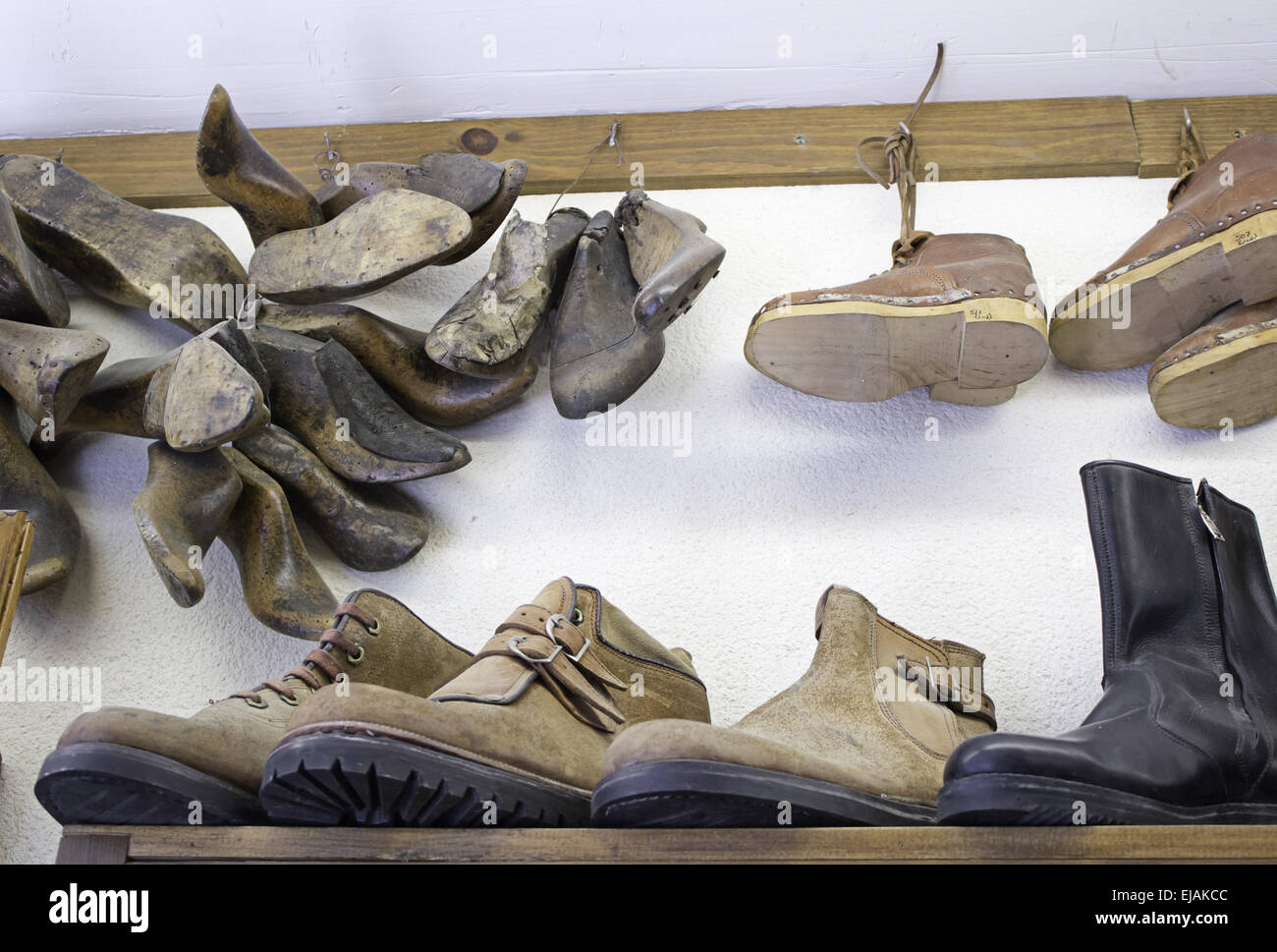 Shoe boots hung on display, sale and footwear Stock Photo