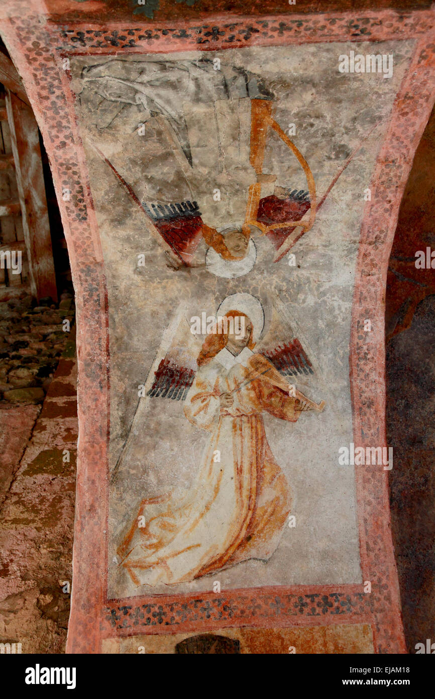 Medieval fresco in the porch of the 14th century Church of Notre Dame de Tramesaygues, Audressein, Ariege, Midi Pyrenees, France Stock Photo