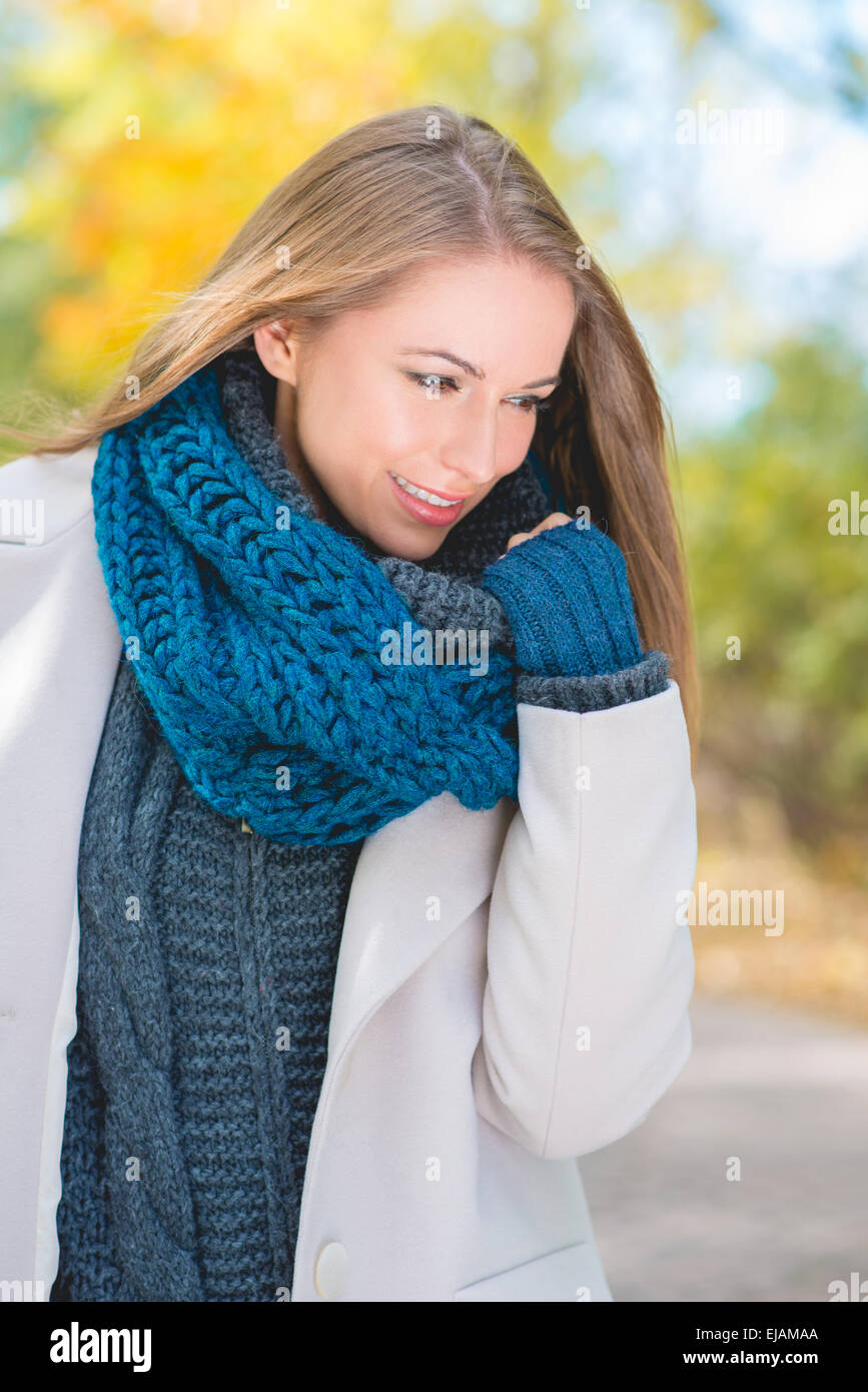 Attractive woman standing thinking Stock Photo