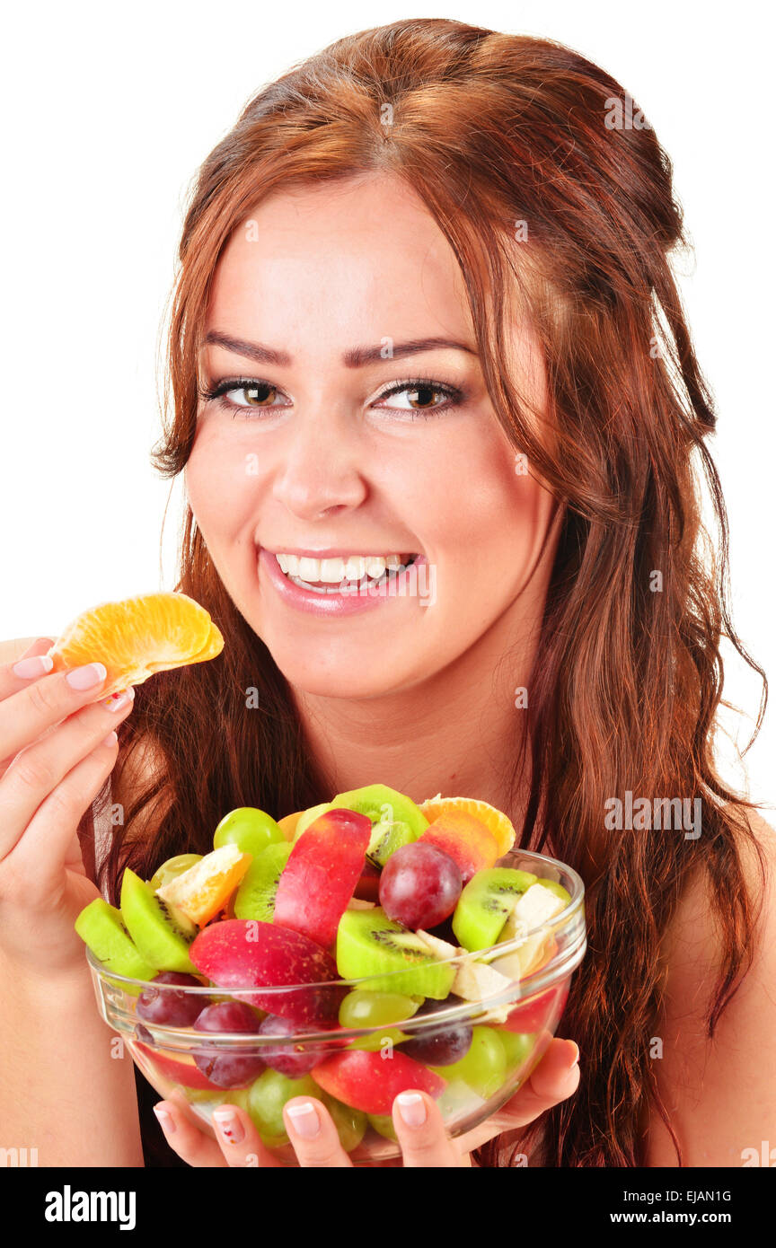 Young woman eating fruit salad Stock Photo Alamy