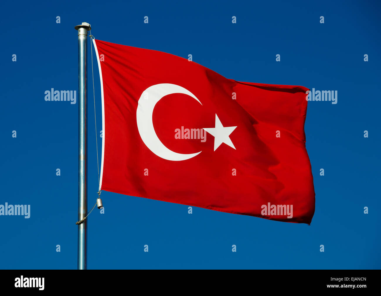 Turkish national flag over blue sky Stock Photo - Alamy