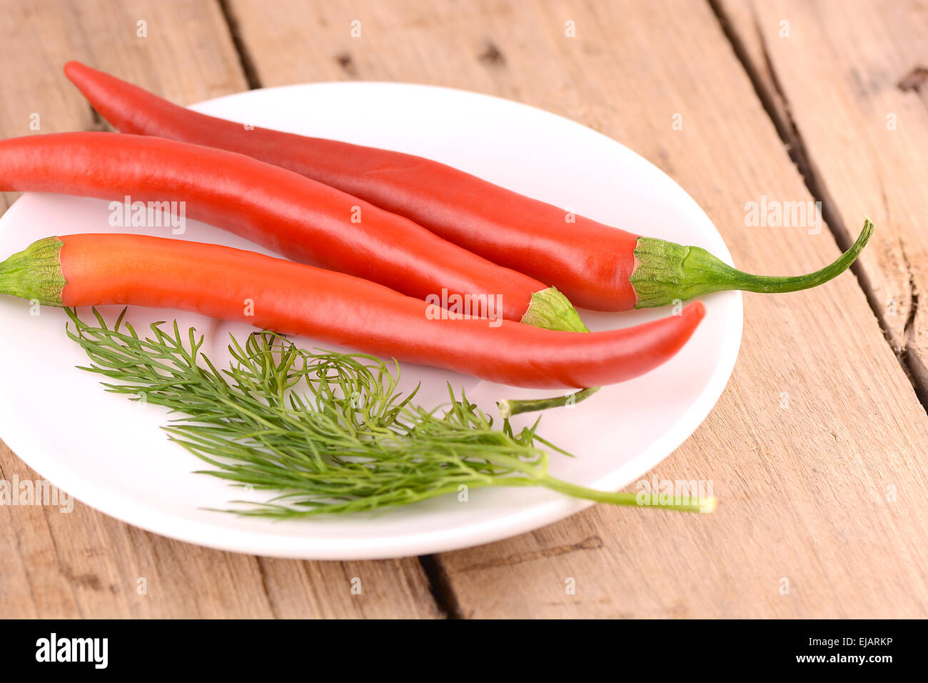 Lots of chilli peppers hi-res stock photography and images - Alamy