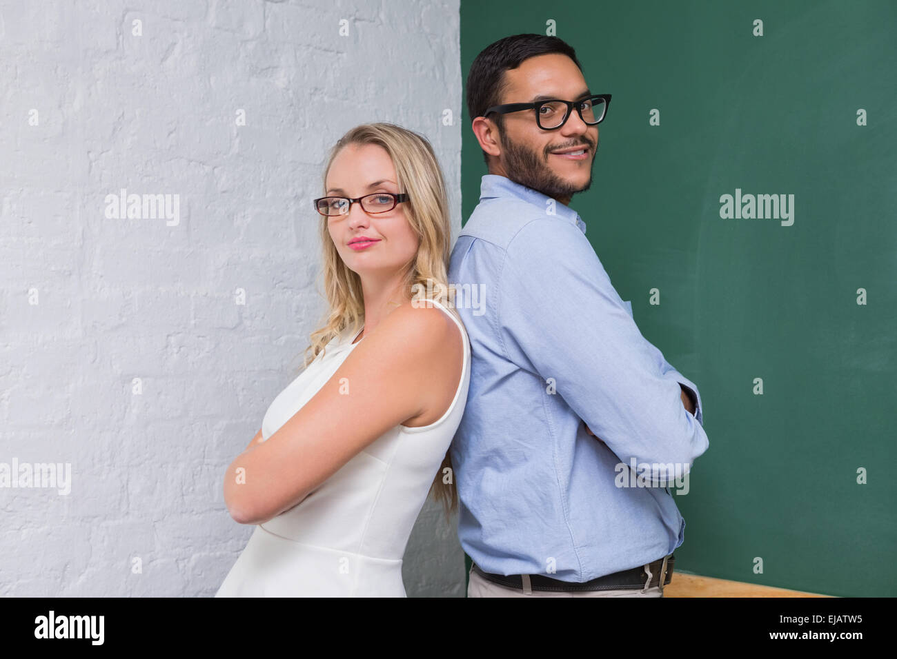 Confident business people with arms crossed Stock Photo - Alamy