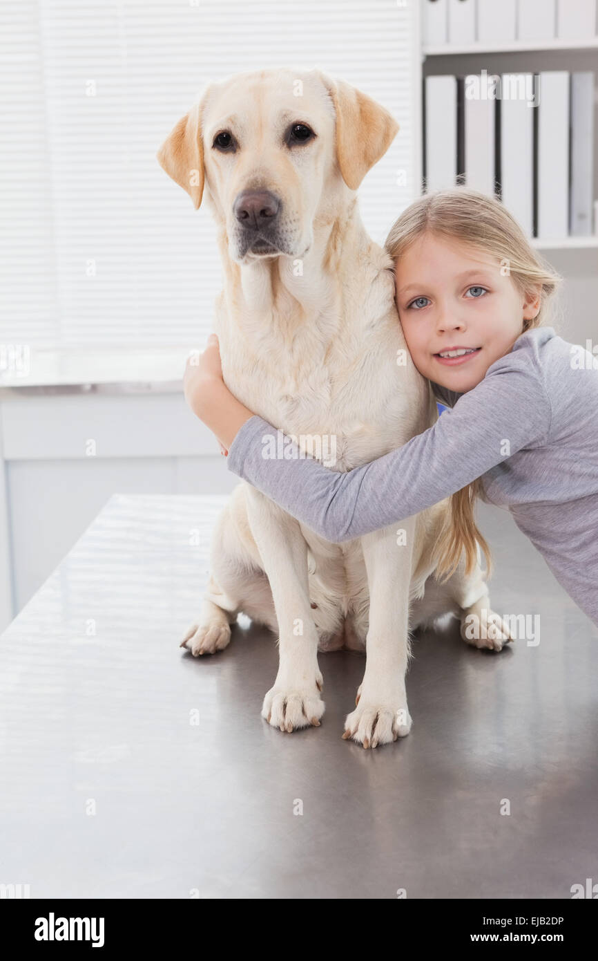 Smiling girl hugging labrador hi-res stock photography and images - Alamy