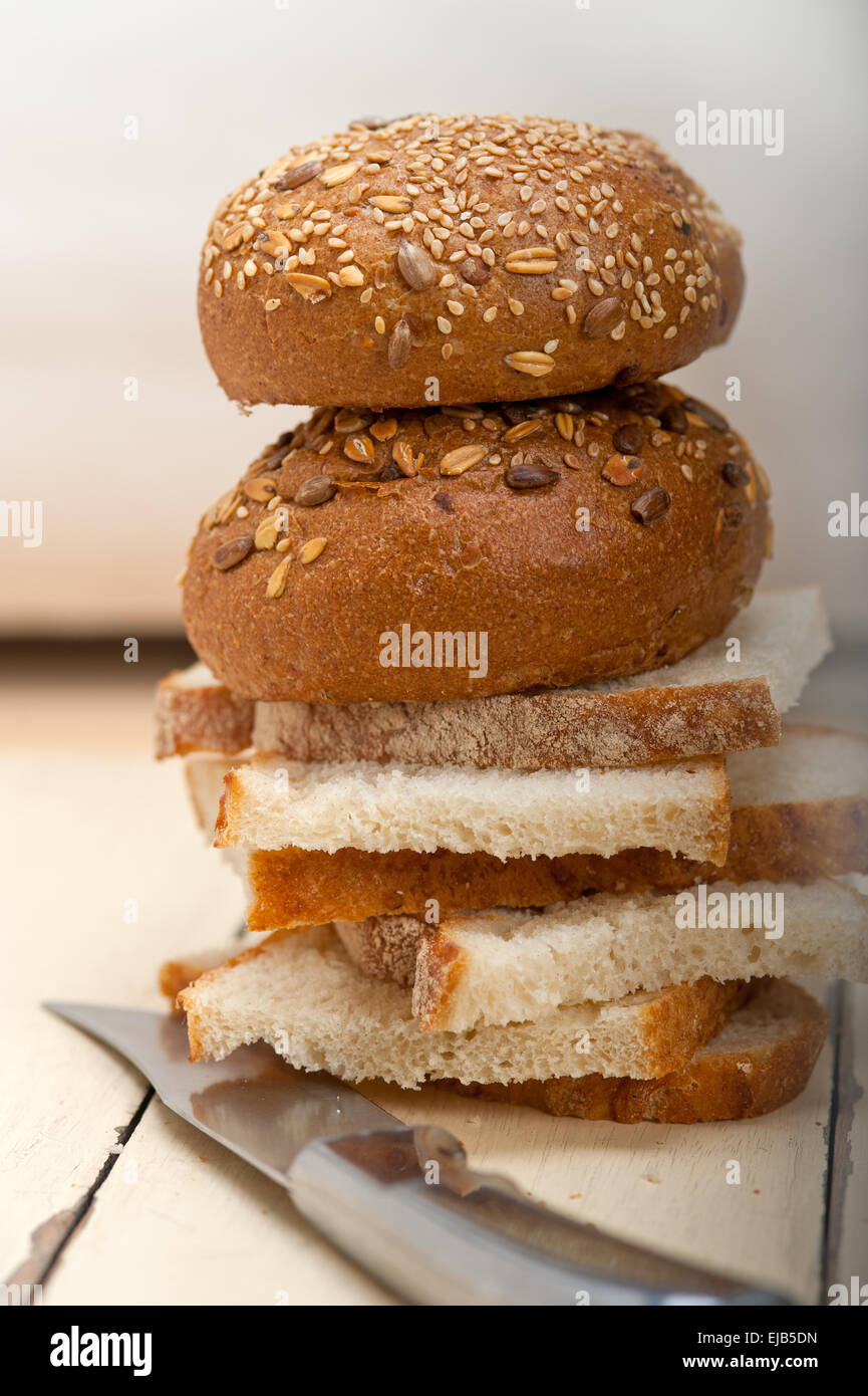 organic bread over rustic table Stock Photo - Alamy