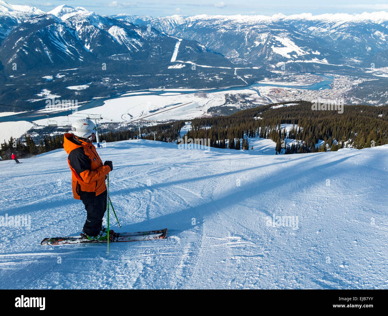 View of Revelstoke town, the valley, Columbia River and Monashees Mountains from the top of Revelstoke ski slope. Stock Photo