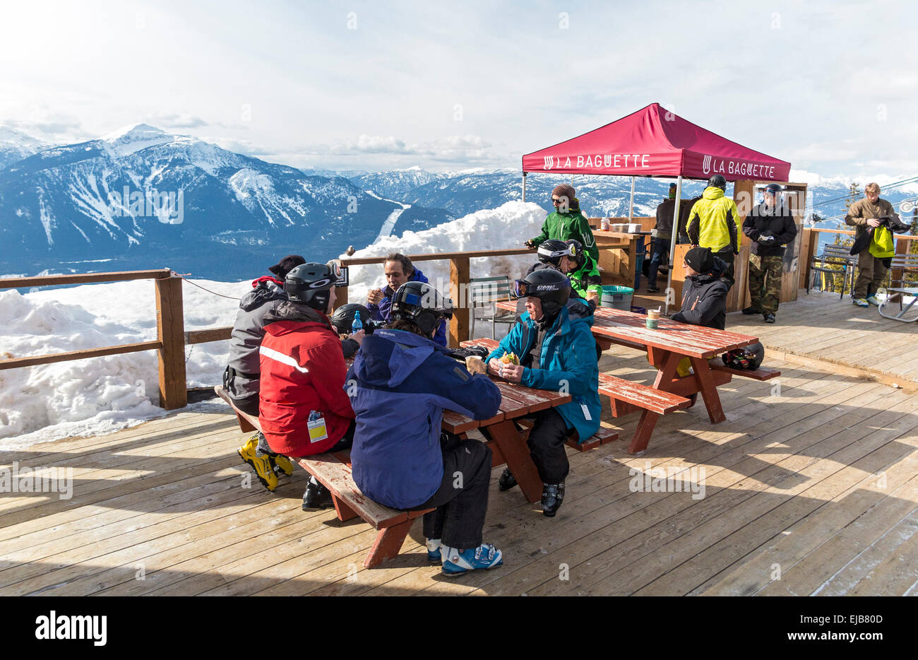Mackenzie Outpost, mid mountain lunch deck at Revelstoke ski resort. The deck has a stunning view of the Monashee mountains. Stock Photo
