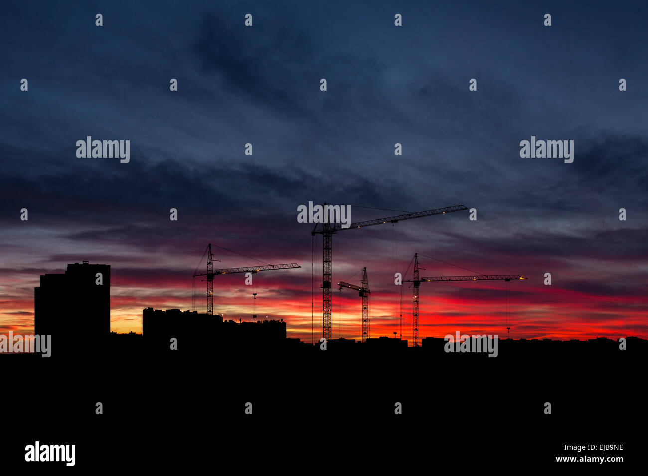 Cityscape with moody sunset sky hi-res stock photography and images - Alamy
