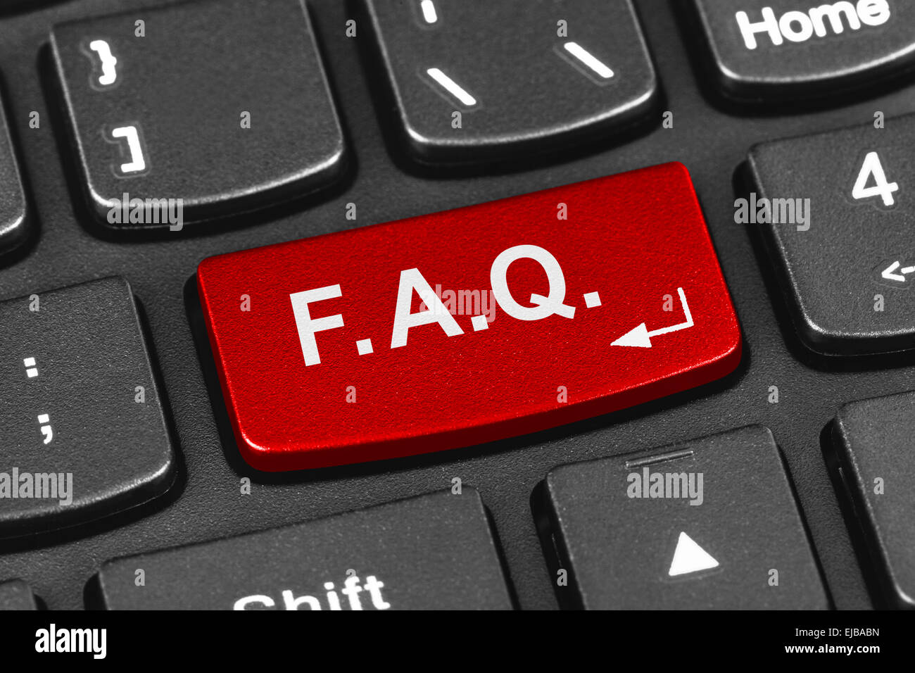Computer notebook keyboard with FAQ key Stock Photo - Alamy