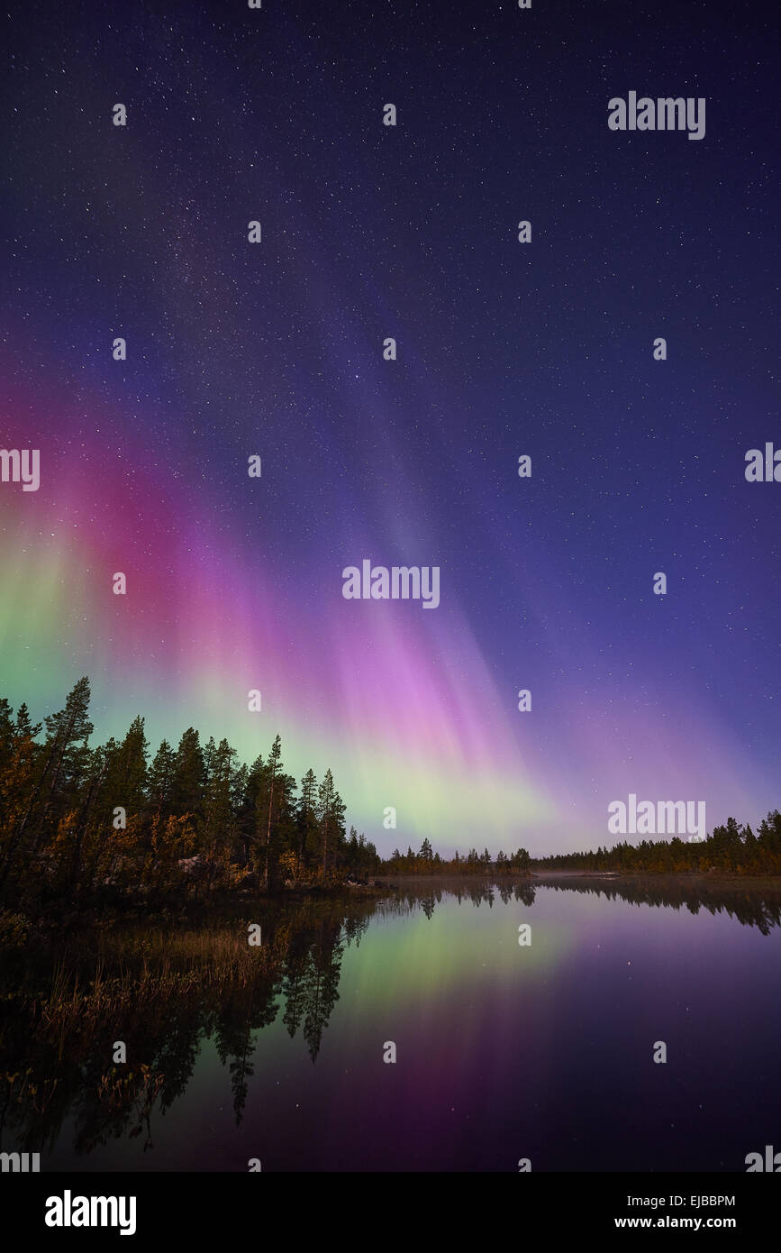 Northern lights reflecting i a lake, Lapland Stock Photo Alamy