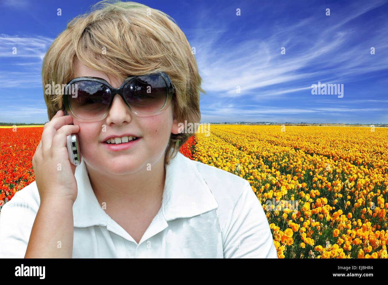 Beautiful fair-haired boy in sunglasses Stock Photo