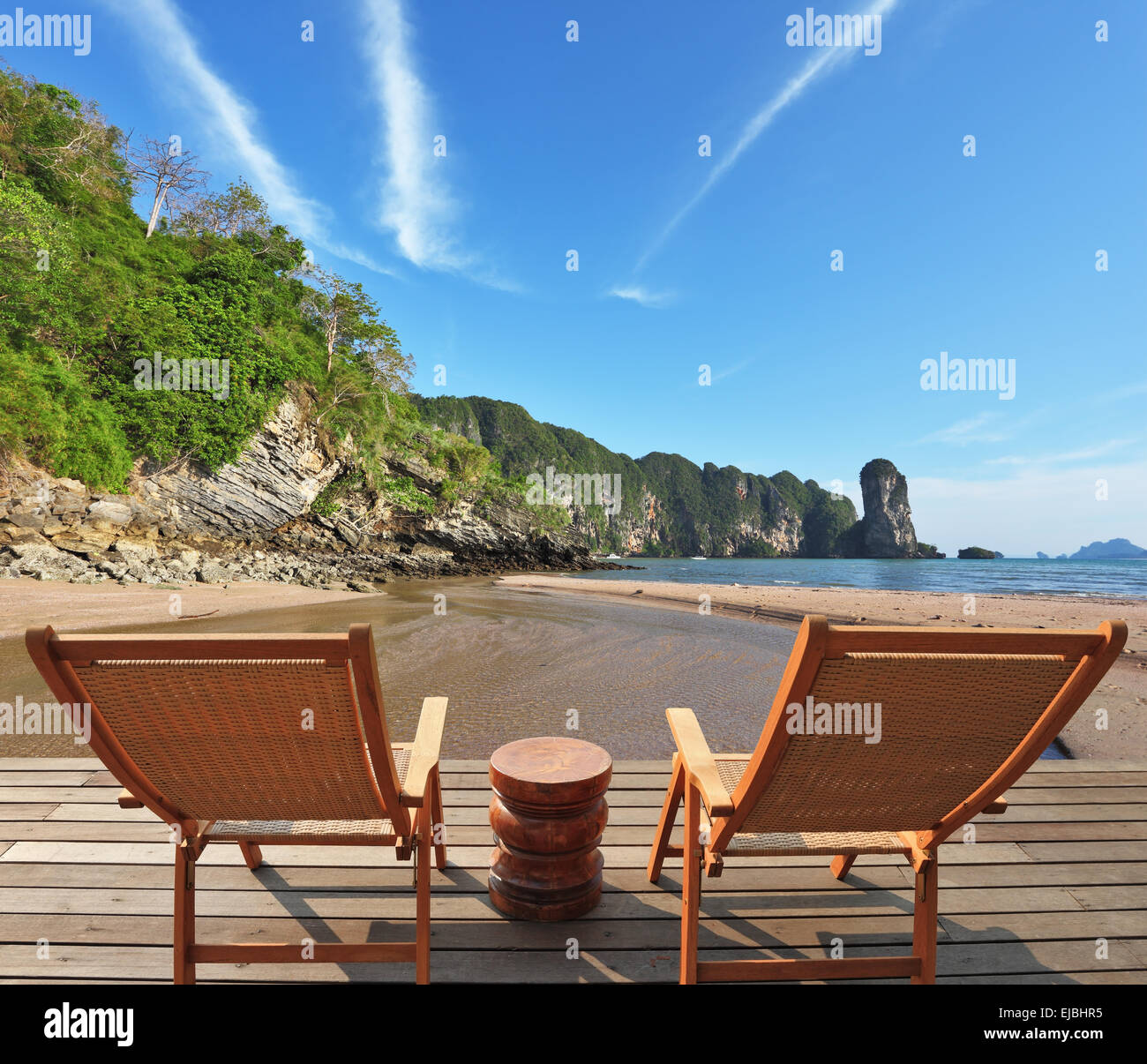 Two wooden chaise lounges Stock Photo
