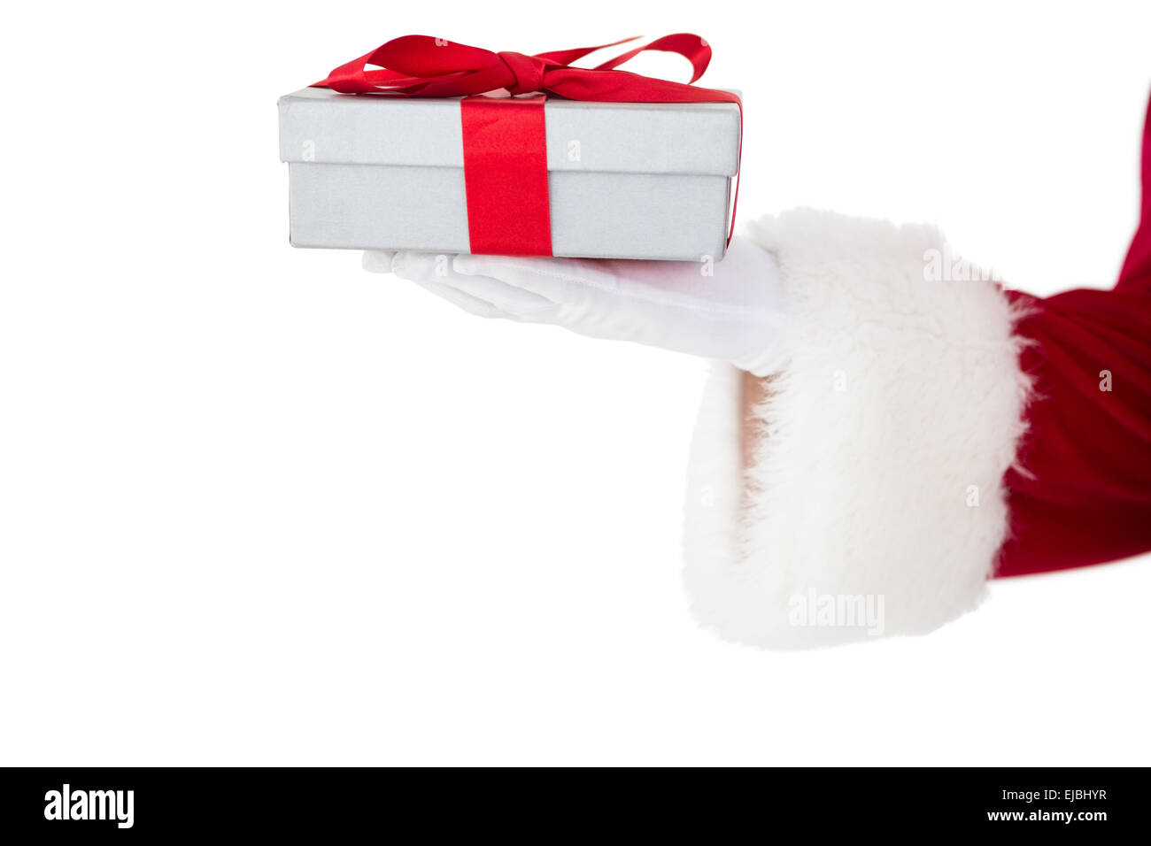 Santa claus showing gift with red ribbon Stock Photo