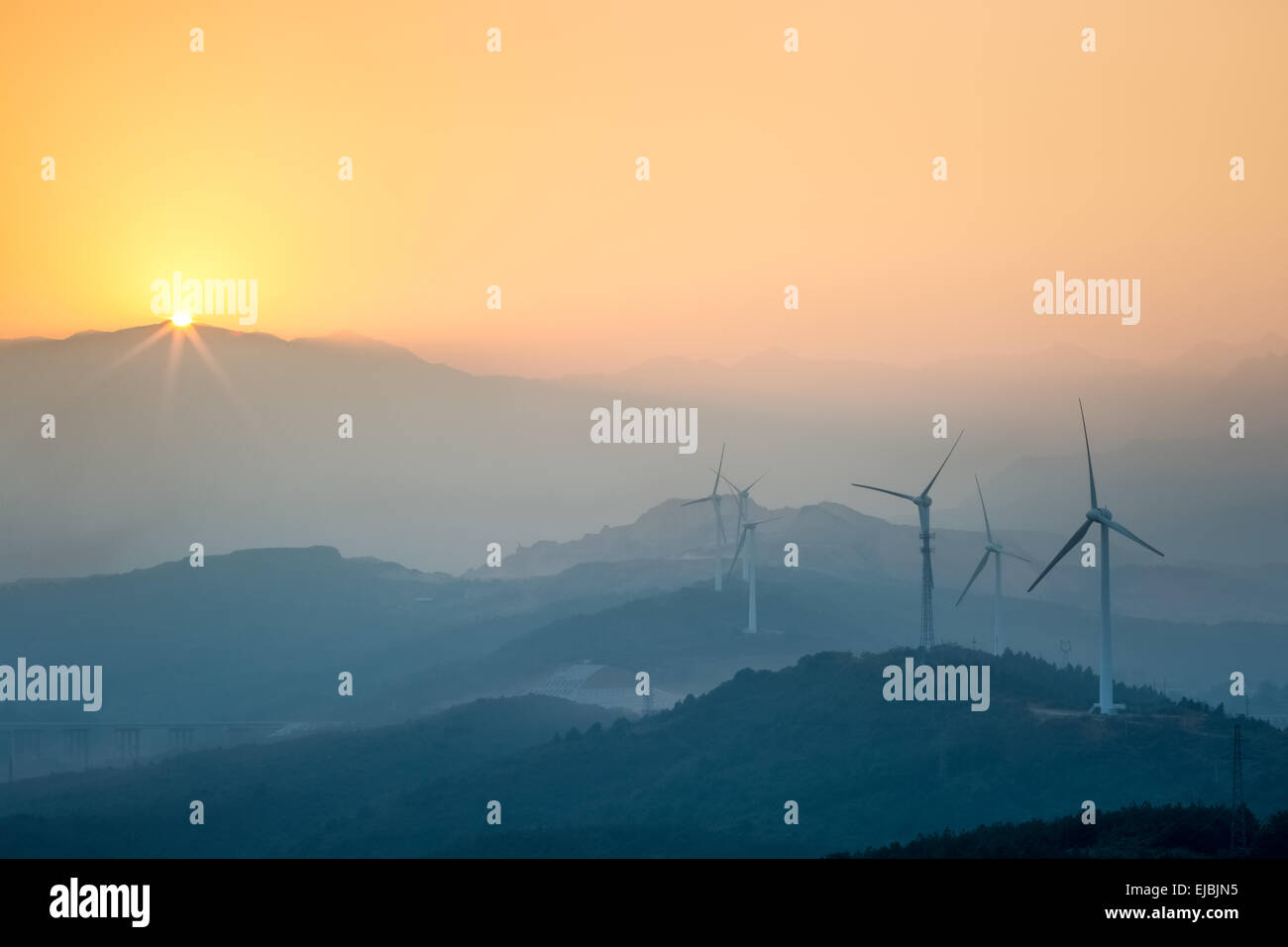 wind farm in sunset Stock Photo