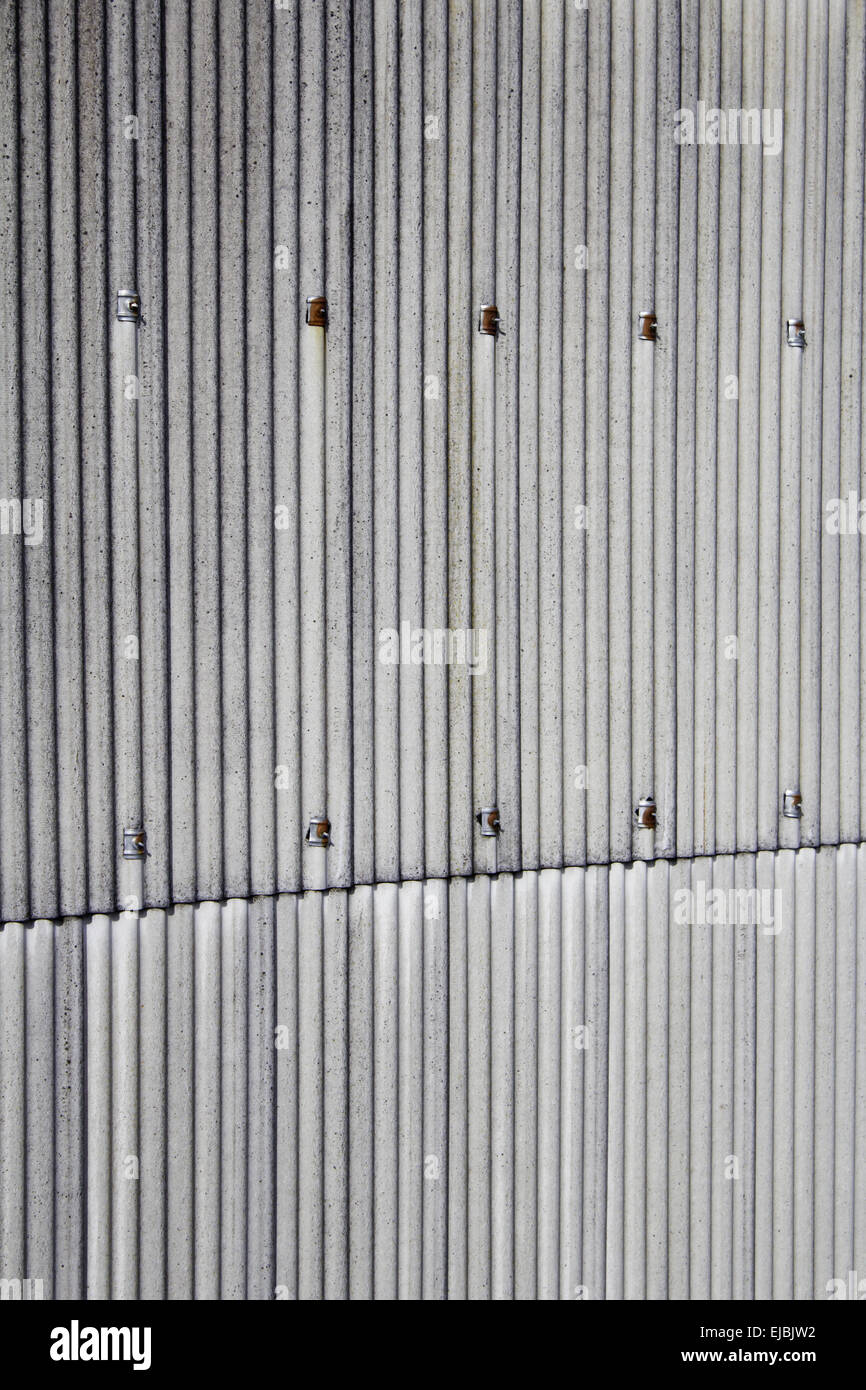 Dirty metal structure on facade of building, construction and ...