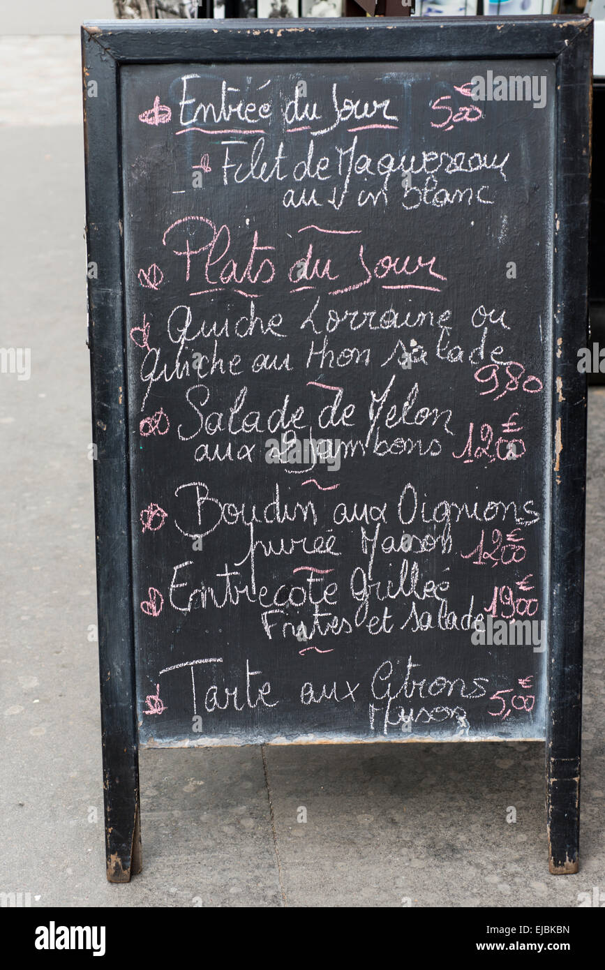 Chalkboard sidewalk cafe menu in Paris, France Stock Photo