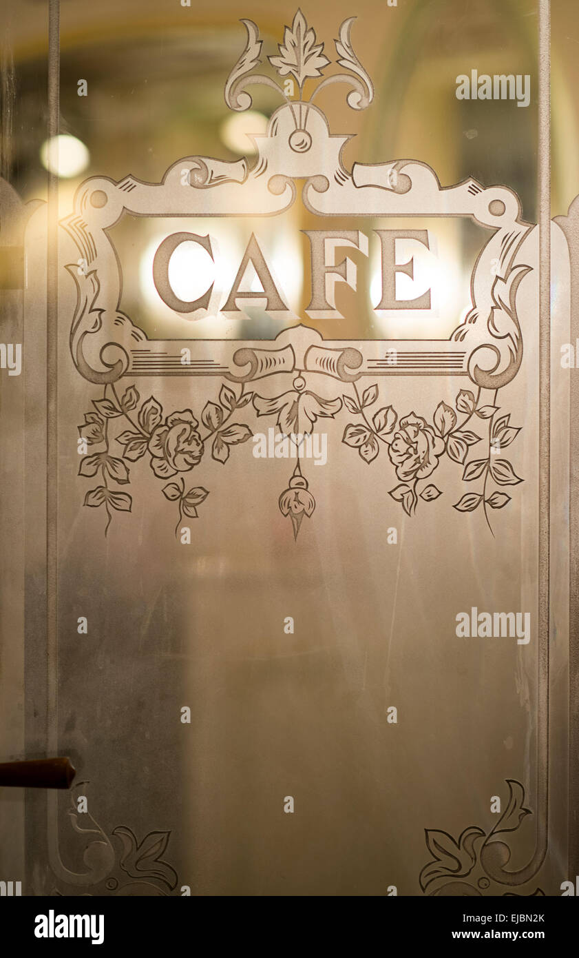 Etched glass cafe sign on door of cafe, Paris, France Stock Photo - Alamy