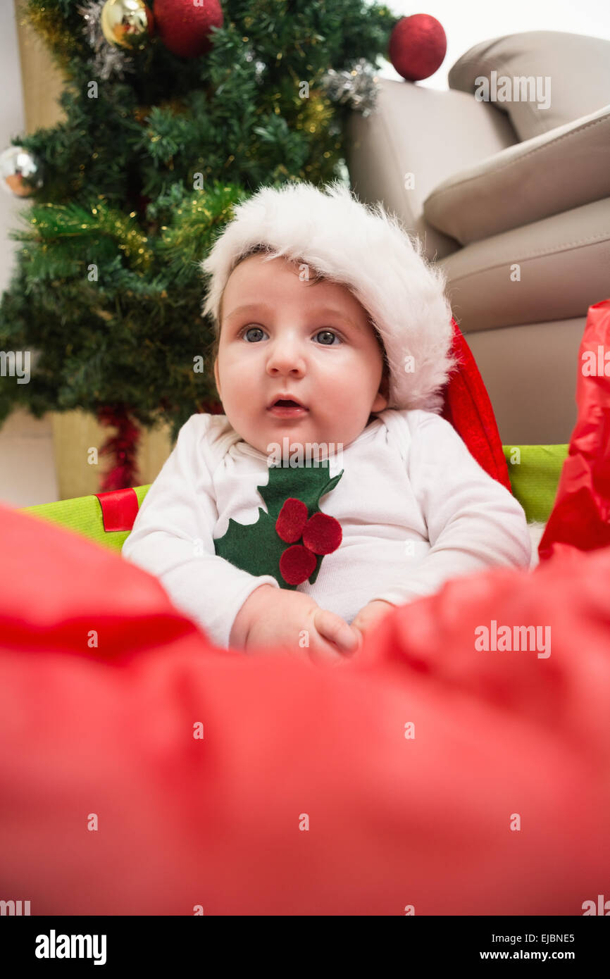 Cute baby boy in large christmas present Stock Photo Alamy