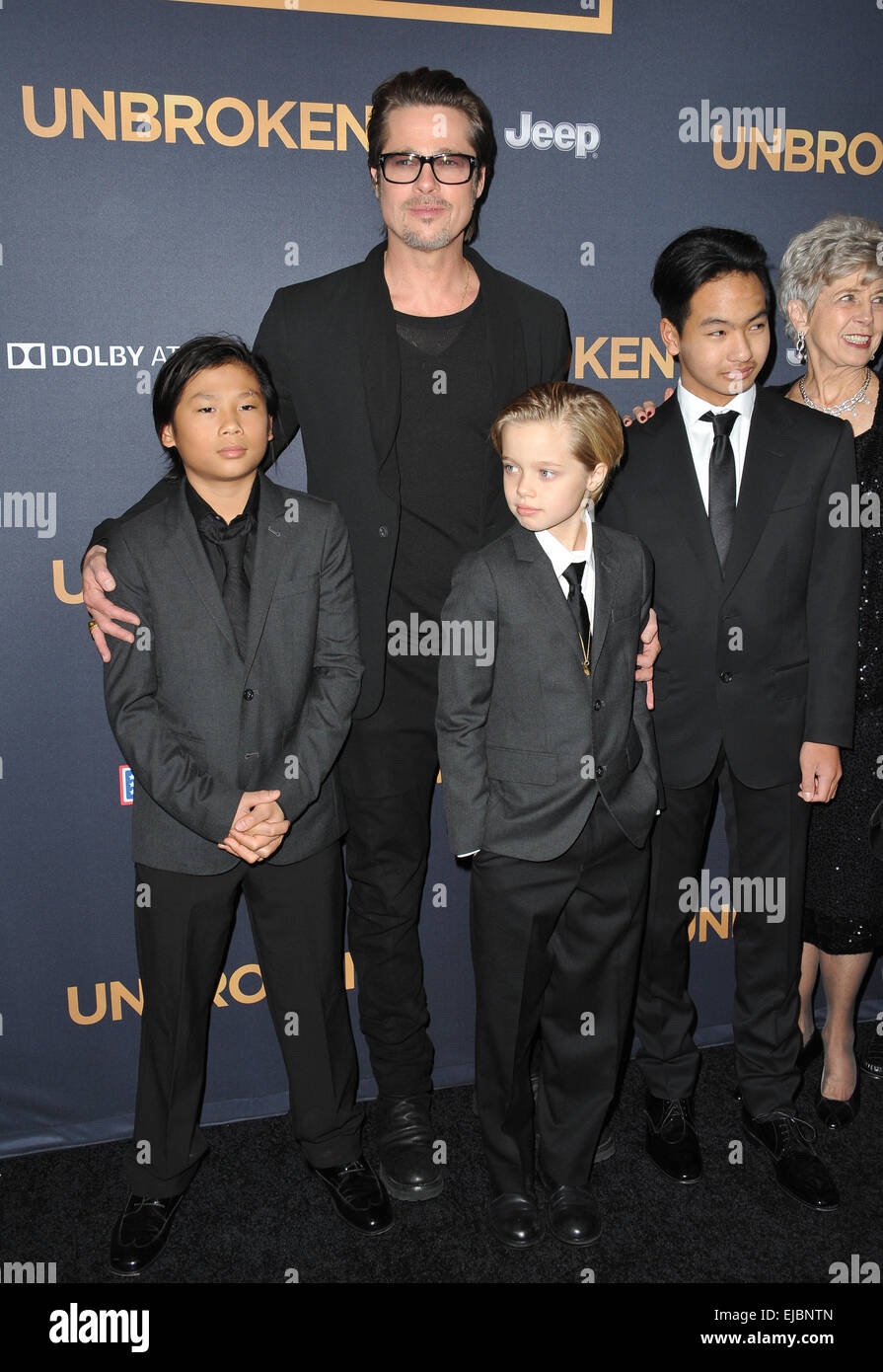 LOS ANGELES, CA - DECEMBER 15, 2014: Brad Pitt & children Pax Jolie-Pitt, Shiloh Jolie-Pitt & Maddox Jolie-Pitt at the Los Angeles premiere of 'Unbroken' at the Dolby Theatre, Hollywood. Stock Photo