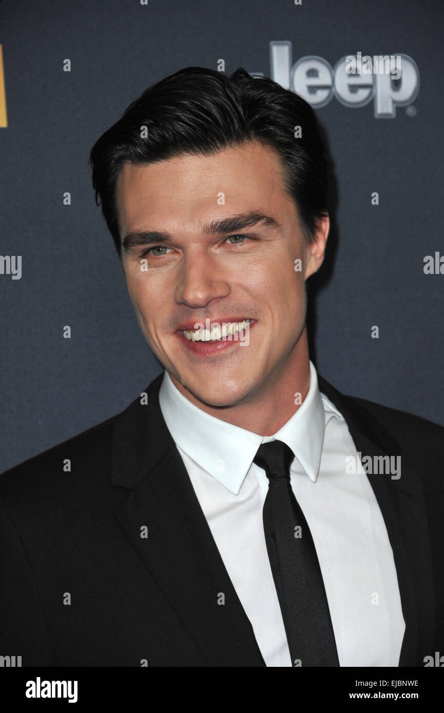 LOS ANGELES, CA - DECEMBER 15, 2014: Finn Wittrock at the Los Angeles premiere of his movie 'Unbroken' at the Dolby Theatre, Hollywood. Stock Photo