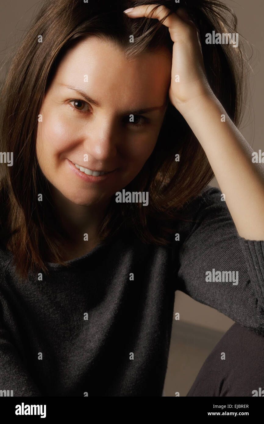 Smiling brunette hi-res stock photography and images - Alamy