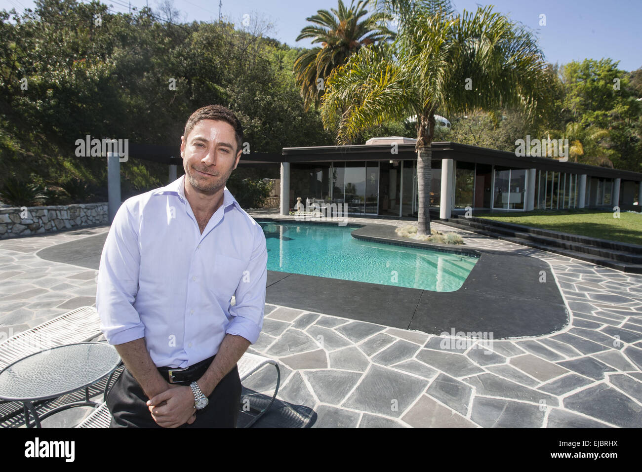 Los Angeles, California, USA. 9th Mar, 2015. Aaron Kirman, a real estate agent with John Aaroe