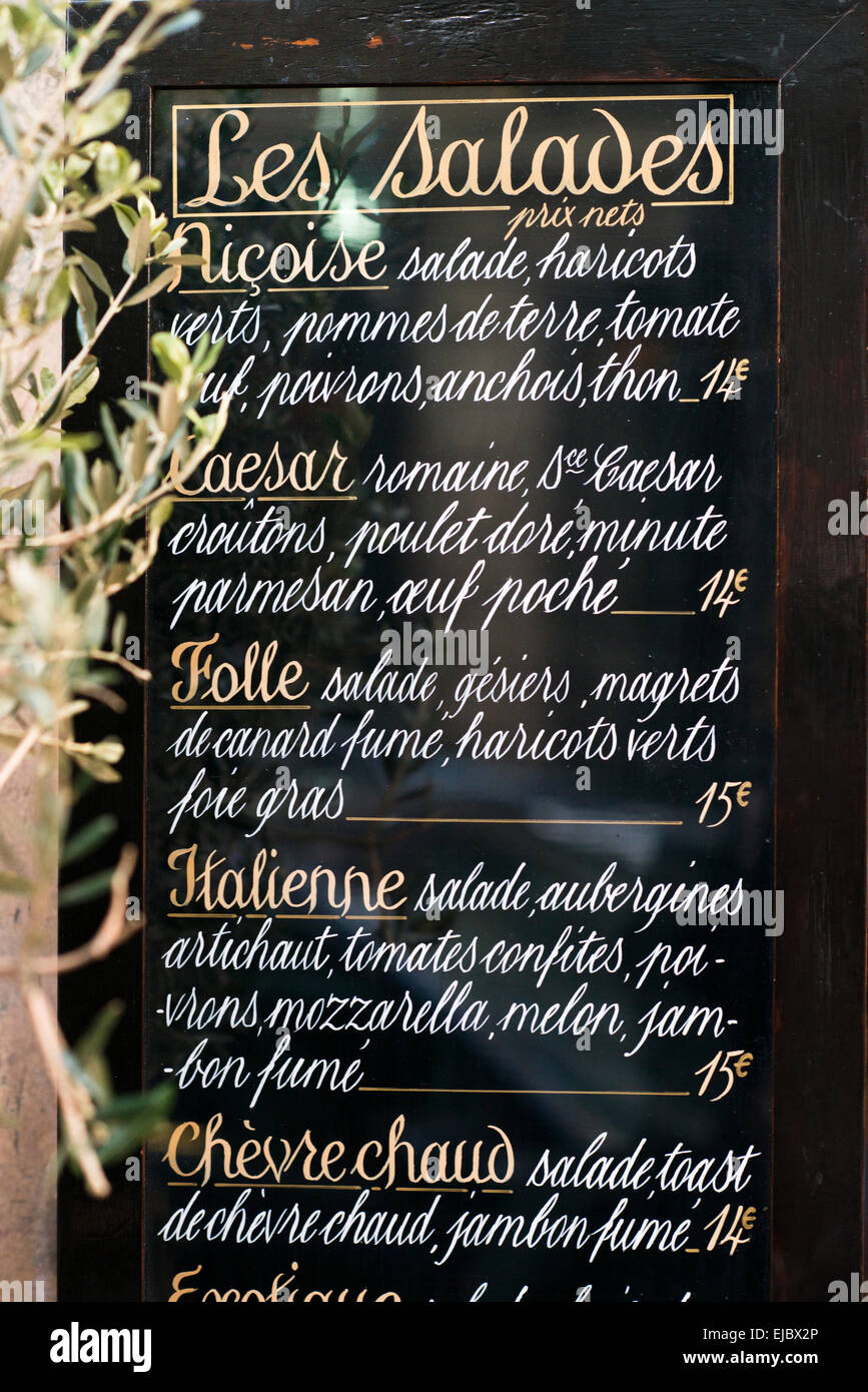 Chalkboard sidewalk cafe menu in Paris, France Stock Photo