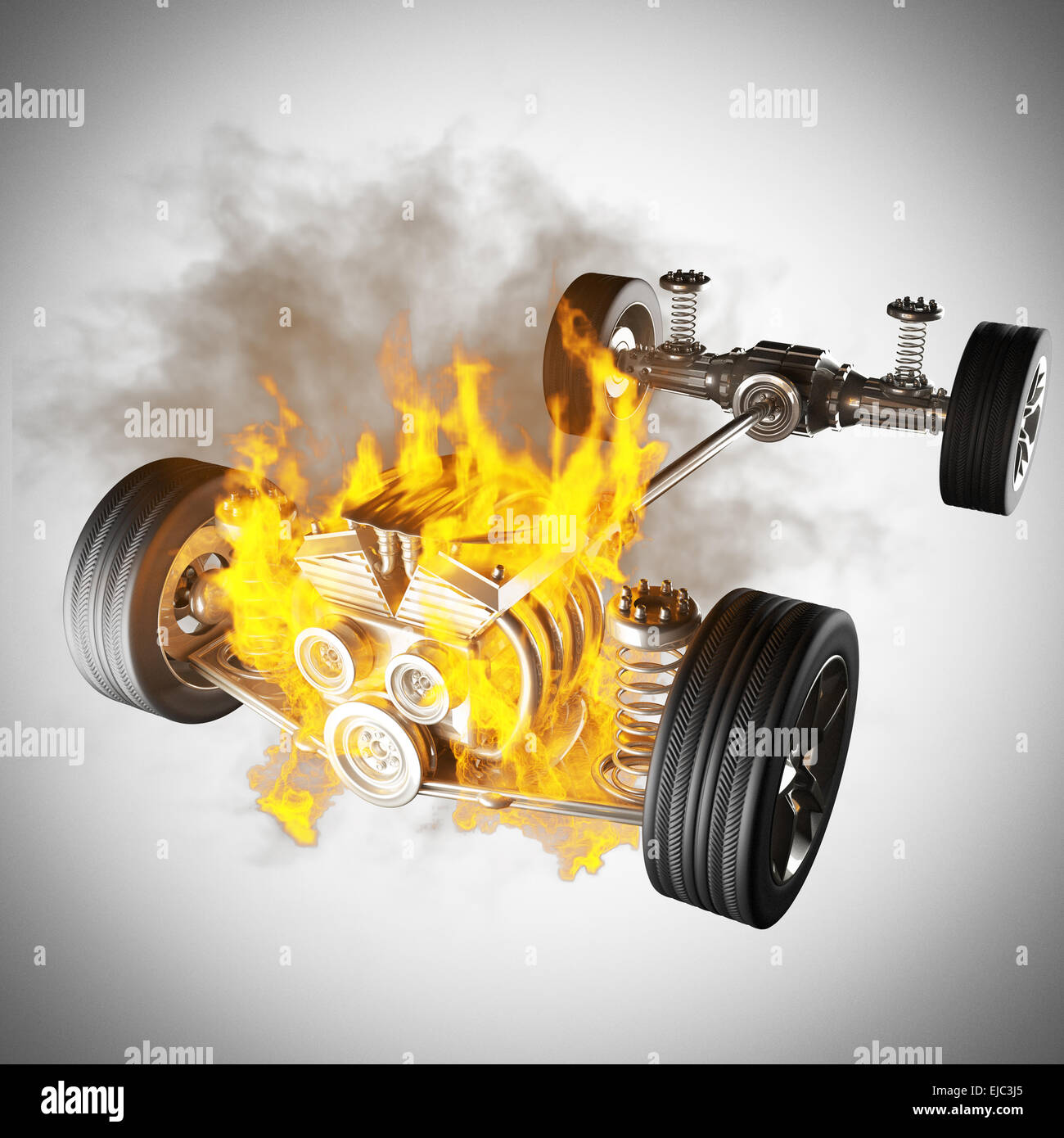 burning car chassis with engine and wheels Stock Photo Alamy
