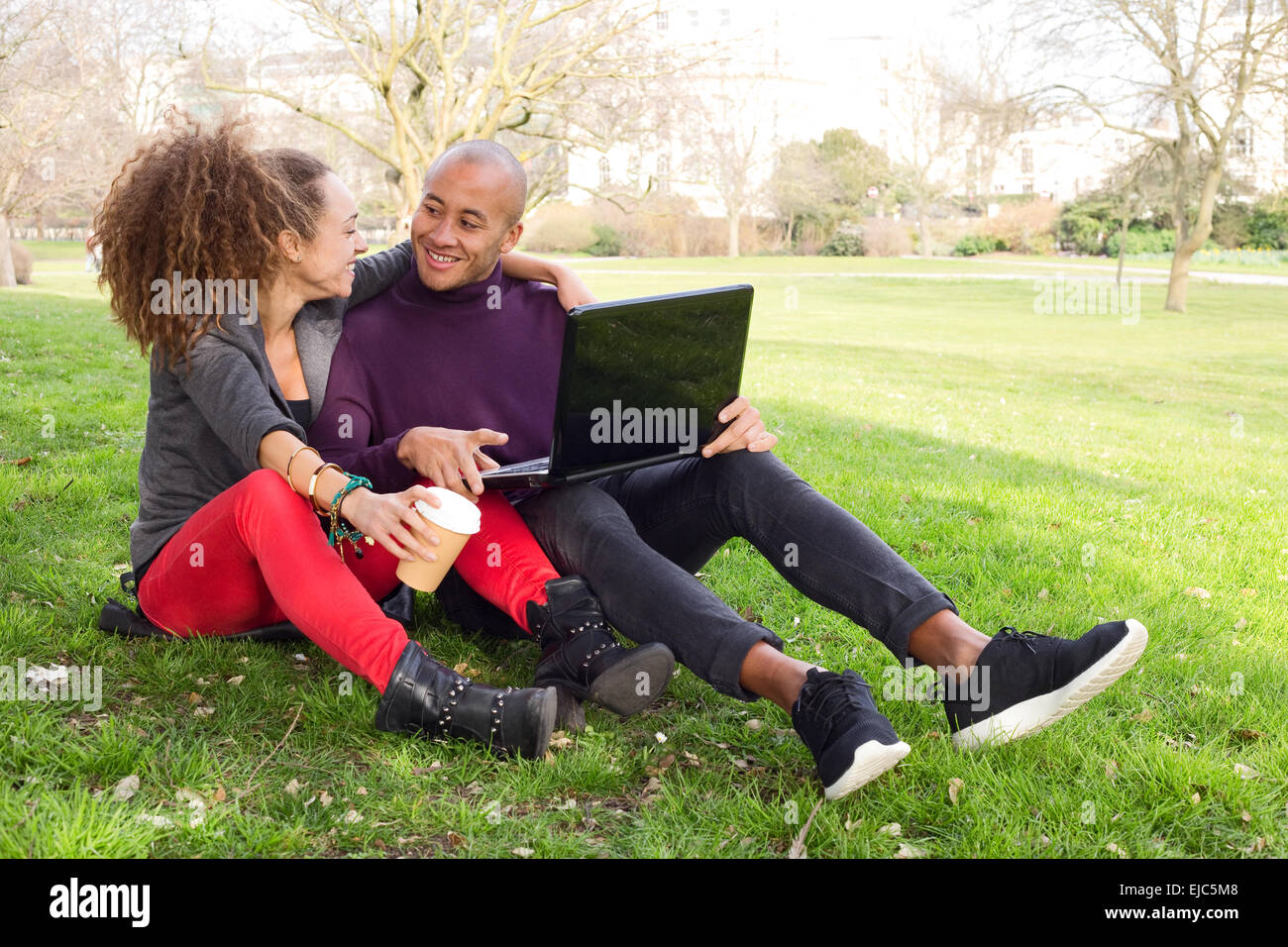 young couple in the park enjoying their day Stock Photo - Alamy