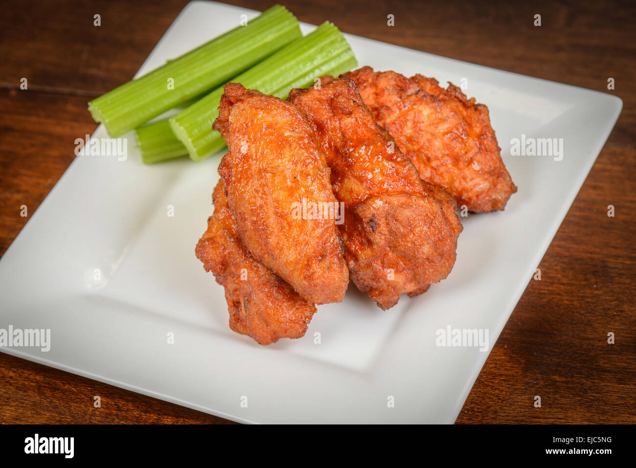 Chicken Buffalo Wings with Celery Sticks Stock Photo Alamy