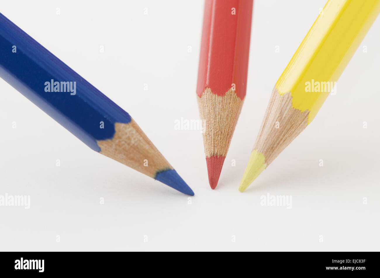 blue red and yellow pencil tips on paper Stock Photo