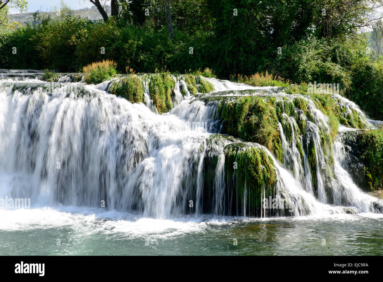 beautiful cascade water fall in the mountain Stock Photo - Alamy