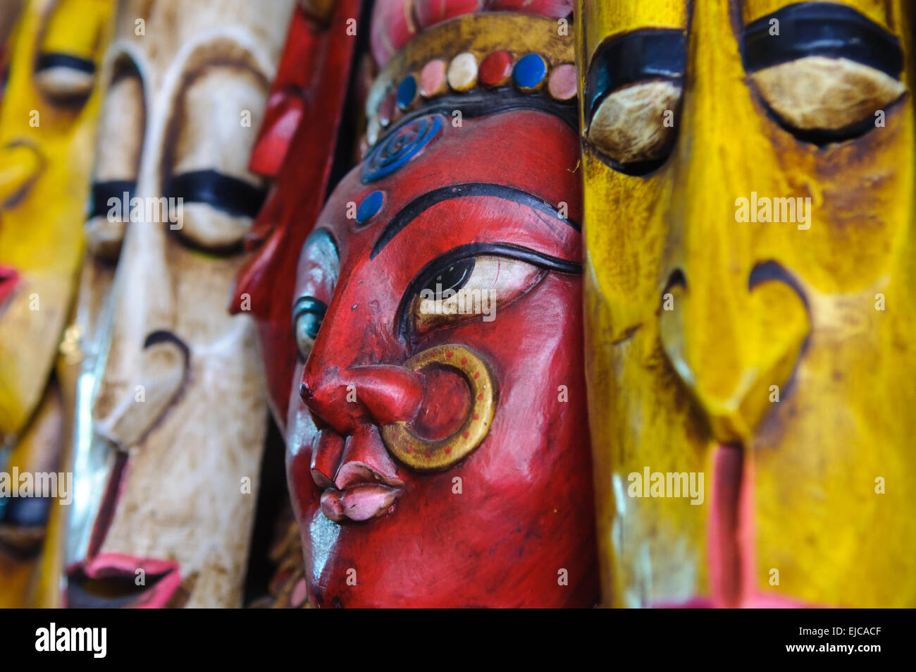 Hindu Indian Mask on Wall Stock Photo