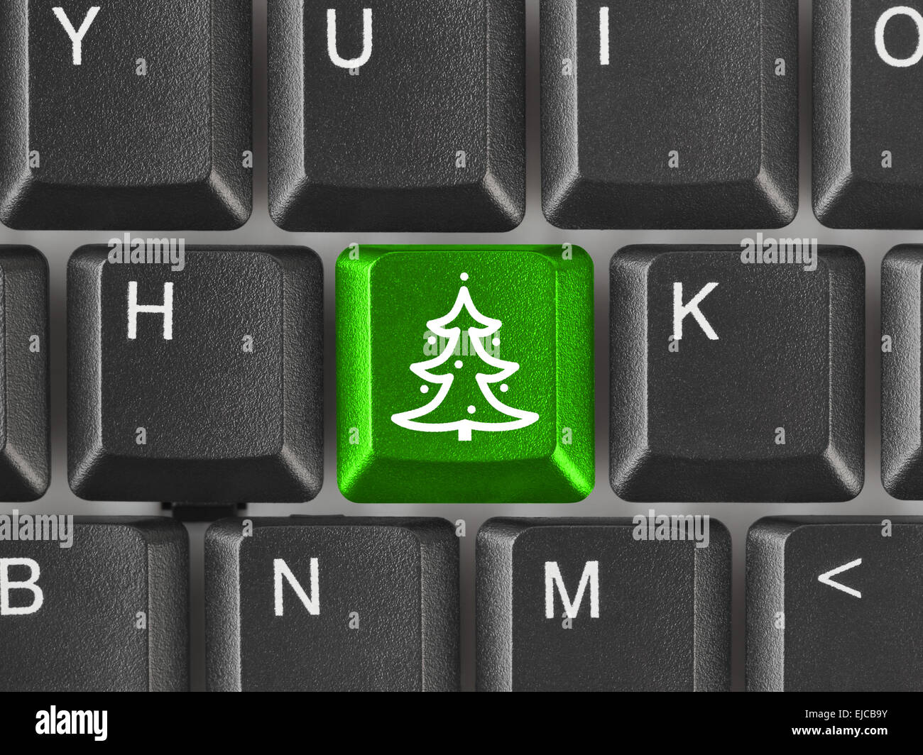 Computer keyboard with Christmas tree key Stock Photo - Alamy