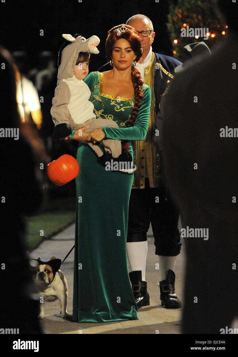 Sofia Vergara wears a Princess Fiona from Shrek costume on the set of  "Modern Family" filming a halloween episode. The actress was joined by co  star Ed O'Neil who was Benjamin Franklin
