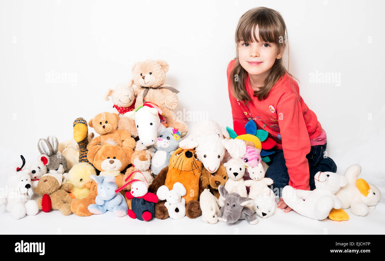 Girl with stuffed animals Stock Photo